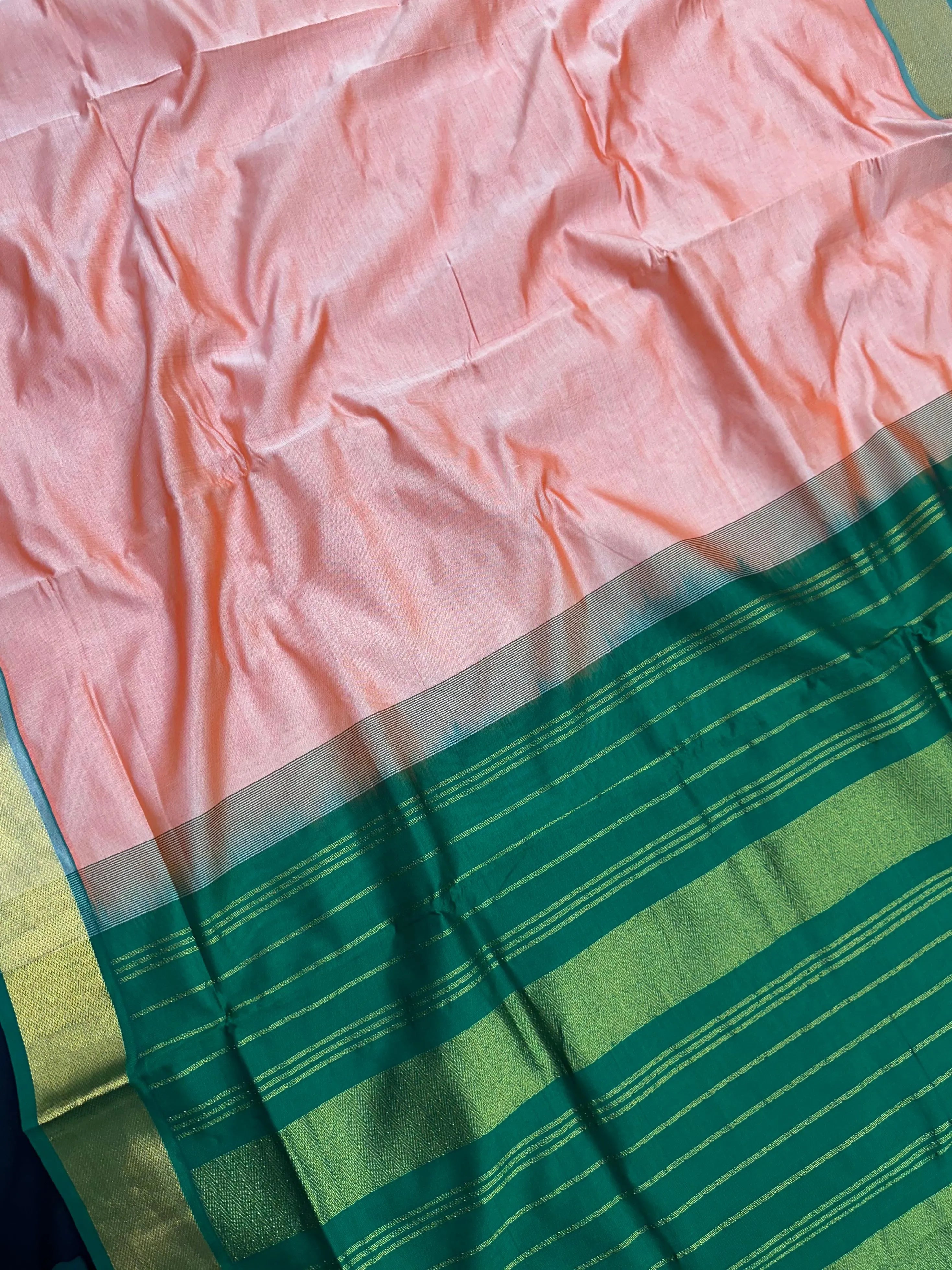 Woman wearing an Uppada Cotton Silk Saree with lightweight, breathable drape and subtle sheen, ideal for office and festive occasions.