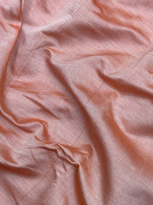 Woman wearing an Uppada Cotton Silk Saree with lightweight, breathable drape and subtle sheen, ideal for office and festive occasions.