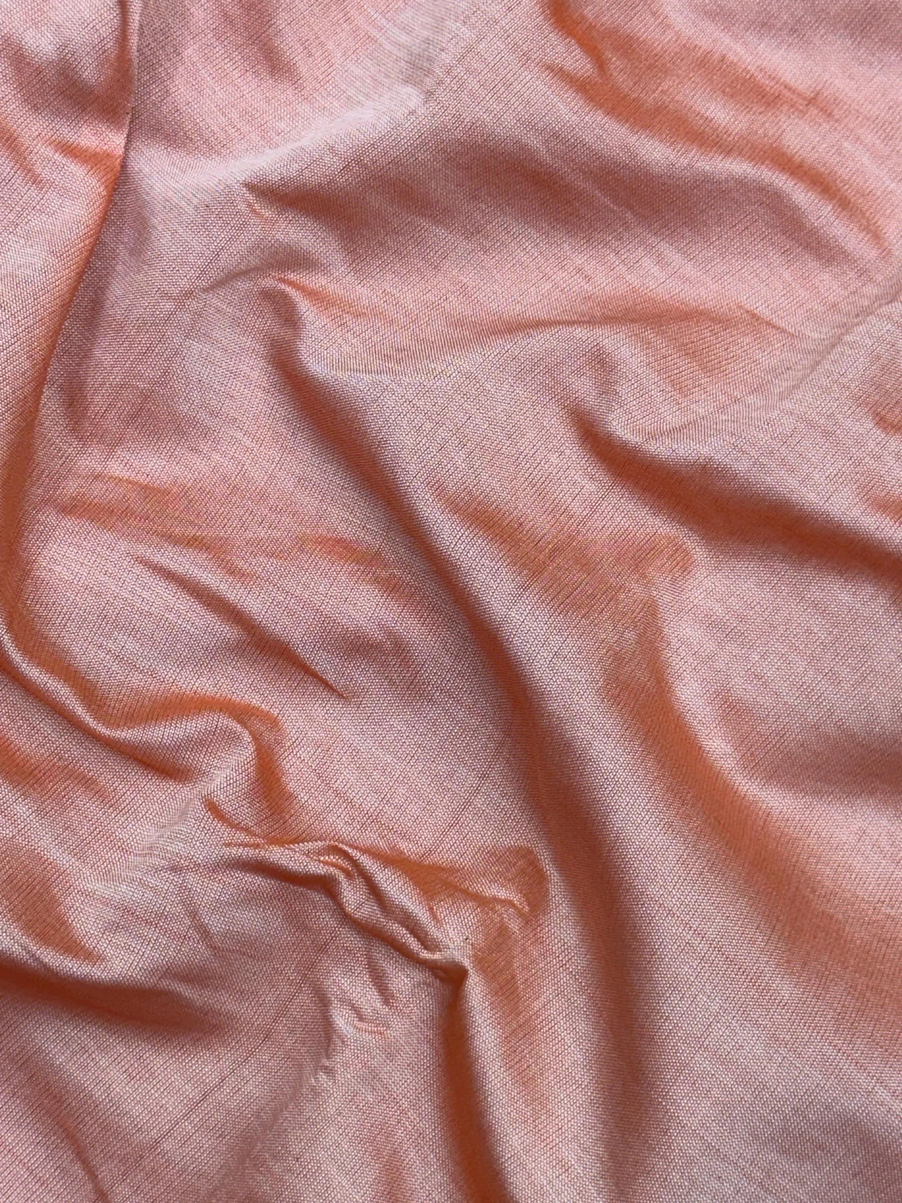 Woman wearing an Uppada Cotton Silk Saree with lightweight, breathable drape and subtle sheen, ideal for office and festive occasions.