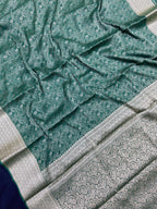 Woman wearing a Binny Crepe Saree with soft, flowing drape and minimal sheen, ideal for office and everyday wear.