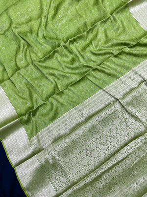 Woman wearing a Binny Crepe Saree with soft, flowing drape and minimal sheen, ideal for office and everyday wear.