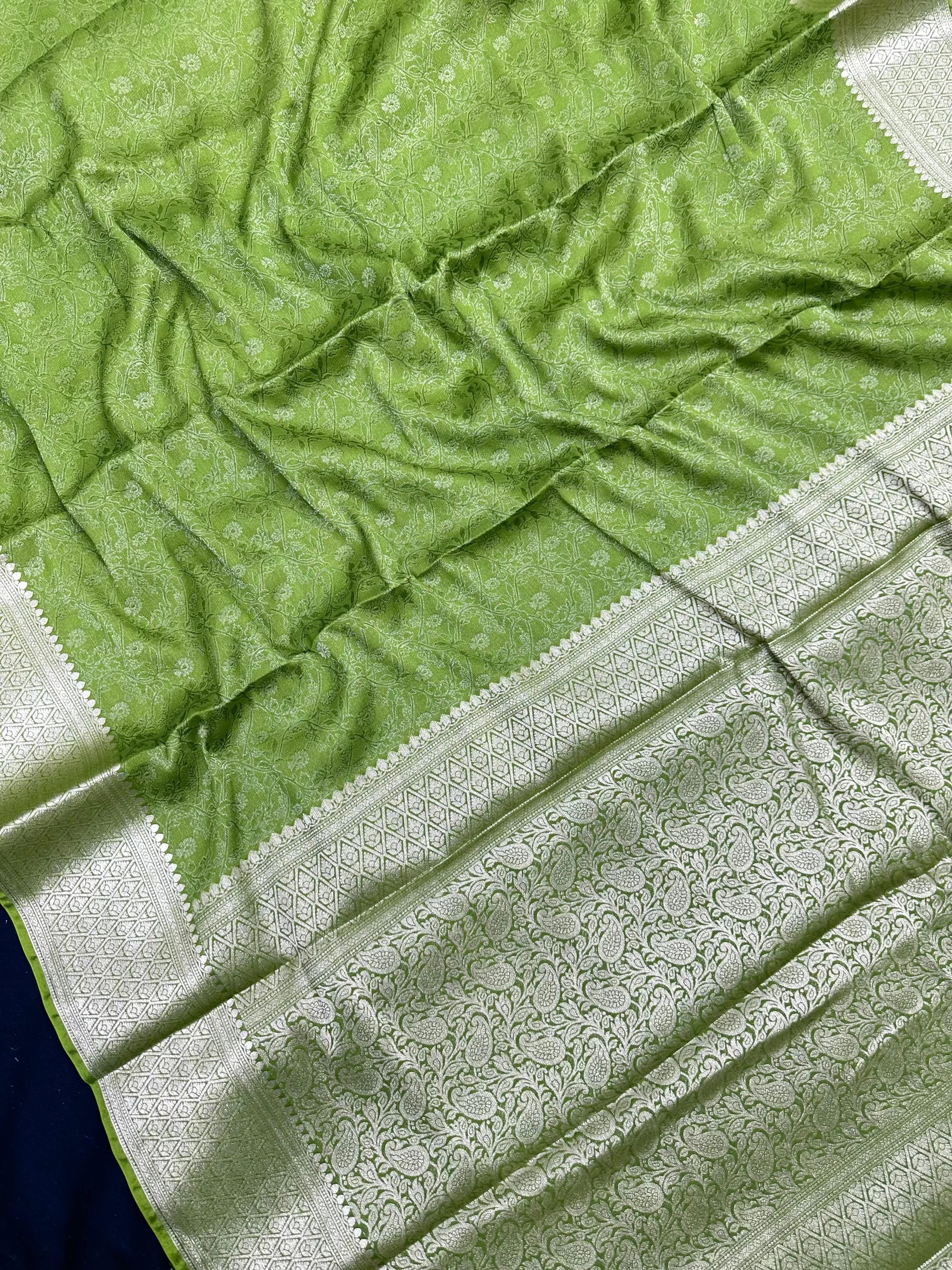 Woman wearing a Binny Crepe Saree with soft, flowing drape and minimal sheen, ideal for office and everyday wear.
