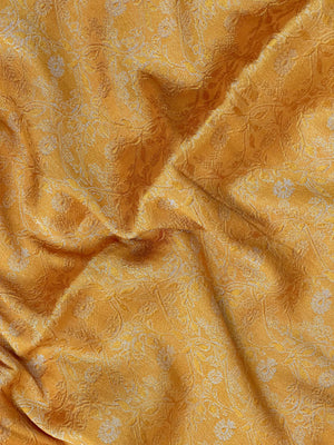 Woman wearing a Binny Crepe Saree with soft, flowing drape and minimal sheen, ideal for office and everyday wear.