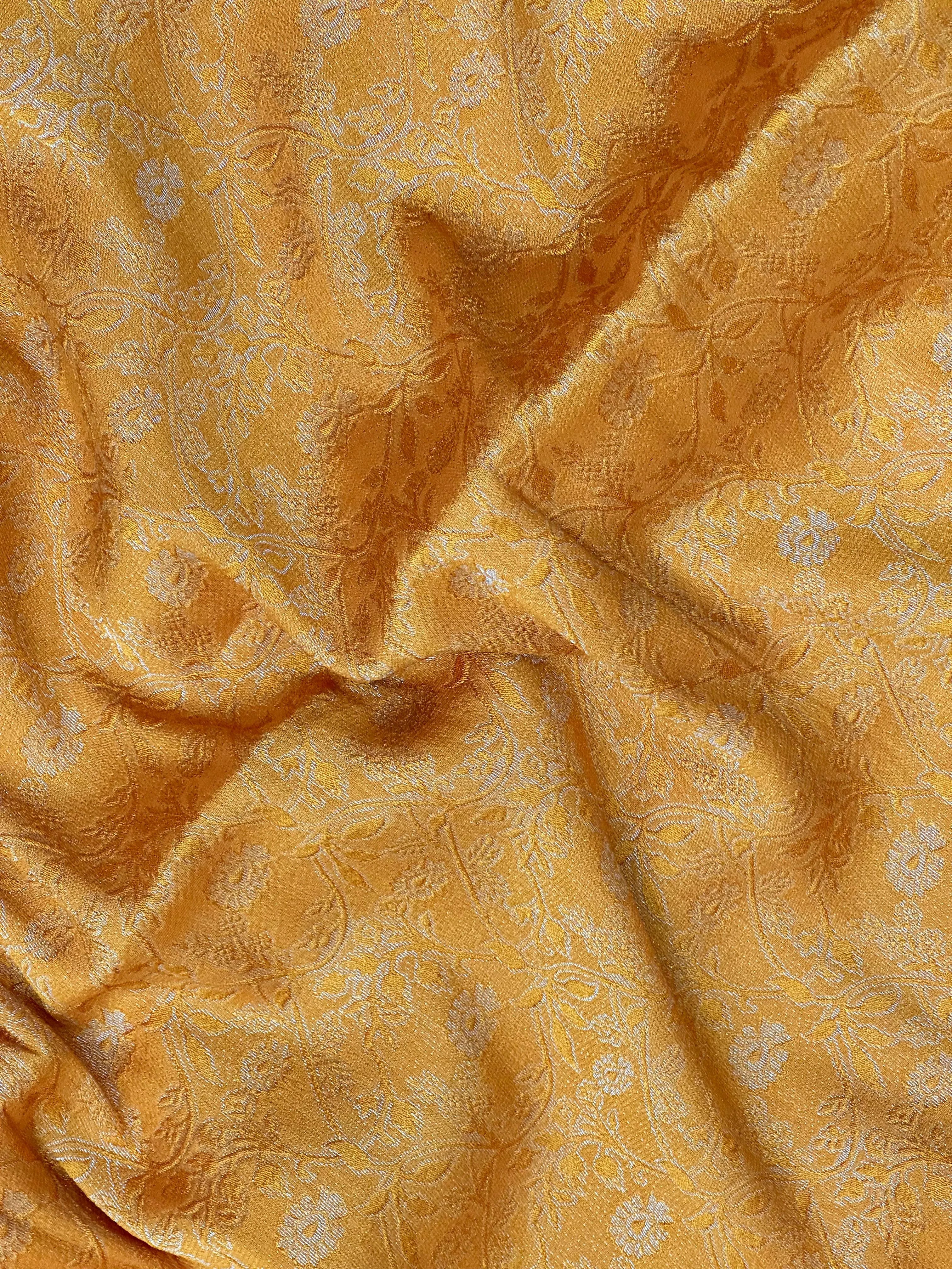 Woman wearing a Binny Crepe Saree with soft, flowing drape and minimal sheen, ideal for office and everyday wear.