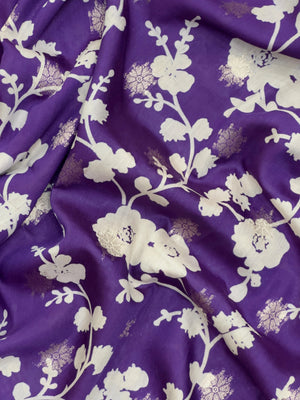 "Purple Musk Malai Cotton Saree featuring intricate Banarasi design, showcasing traditional craftsmanship with a soft, breathable fabric in a rich purple hue."