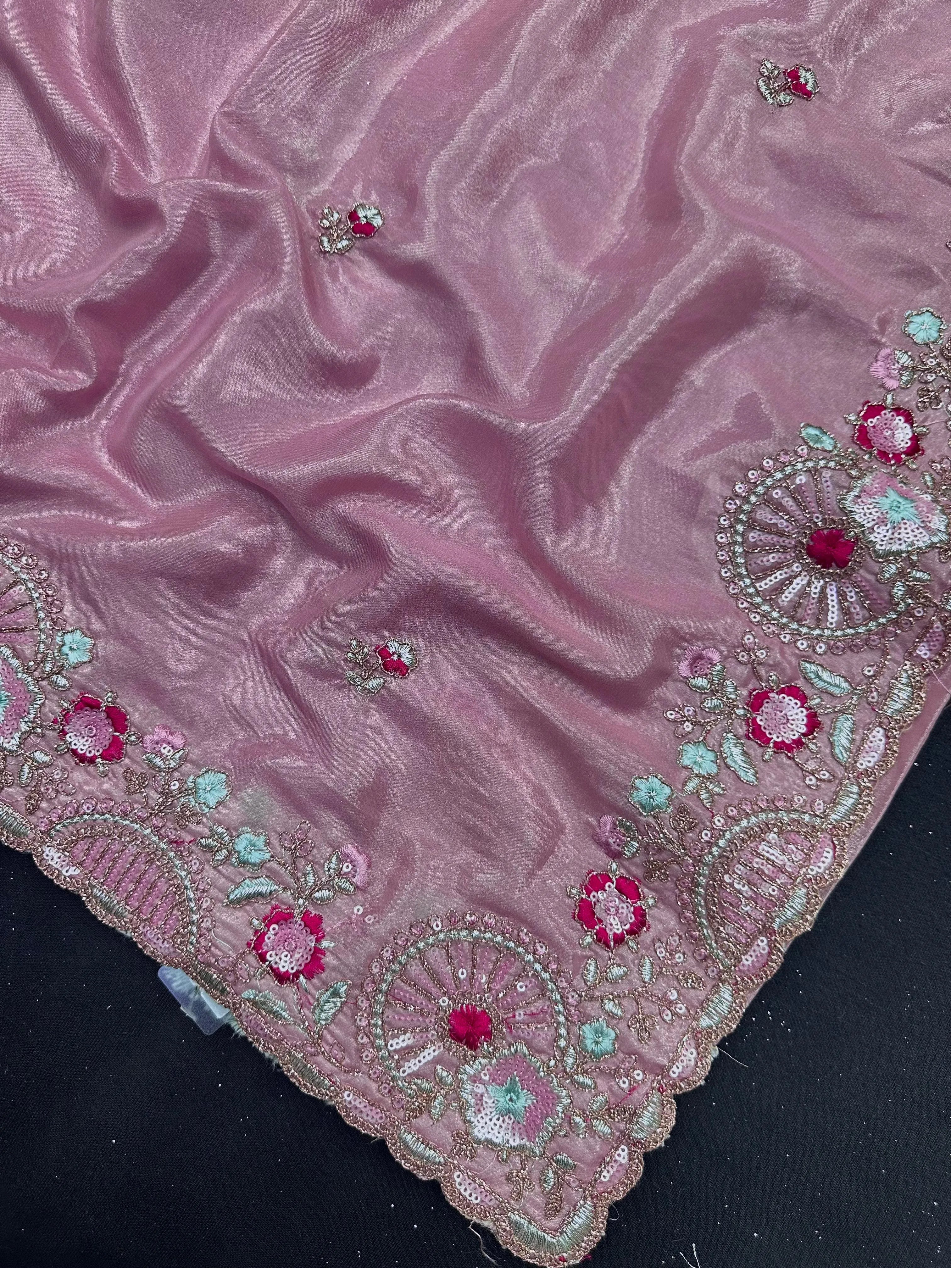 Woman draped in a Fancy Silk Saree with glossy texture and designer patterns – perfect for parties and festive events.