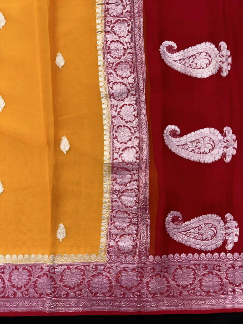 Banarasi Pure Khaddi Chiffon Silver Zari Mustard Yellow Colour Saree With Contrast Red Blouse & Pallu