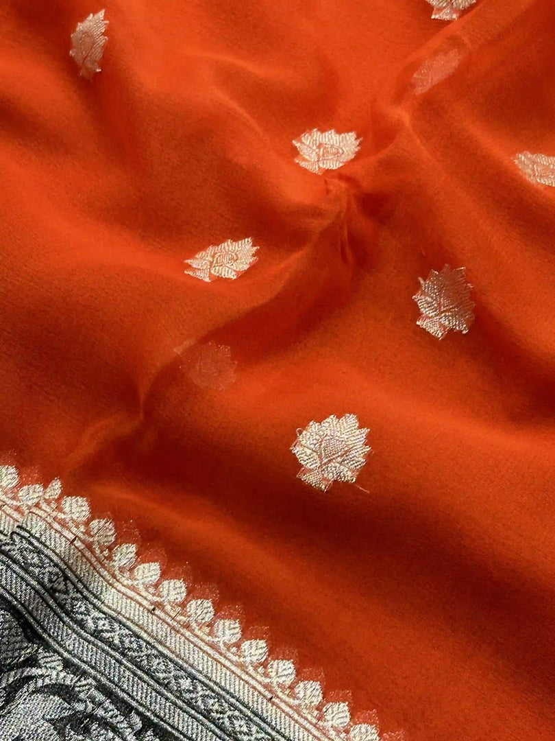 Banarasi Pure Khaddi Chiffon Silver Zari Dark Orange Colour Saree With Contrast Black Blouse & Pallu