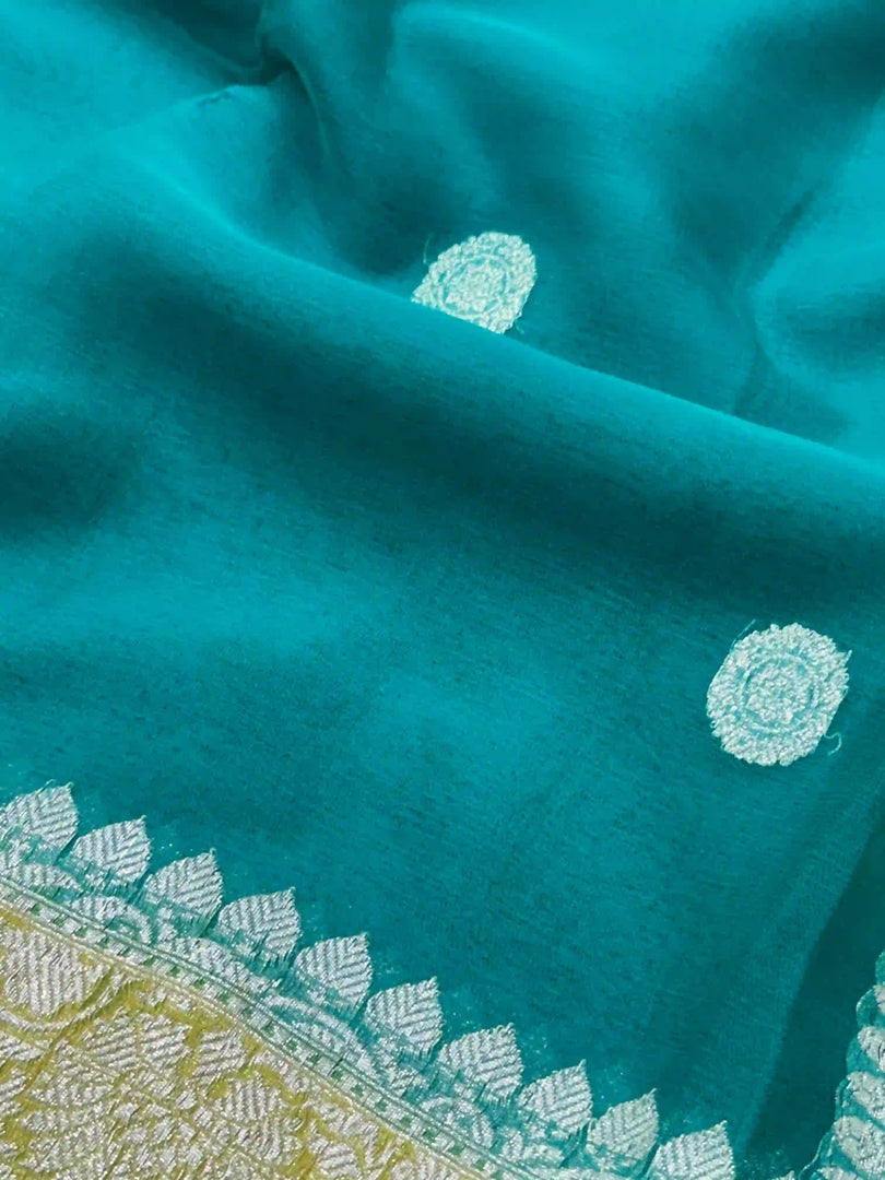 Banarasi Pure Khaddi Chiffon Silver Zari Marine Blue Colour Saree With Contrast Yellow Blouse & Pallu
