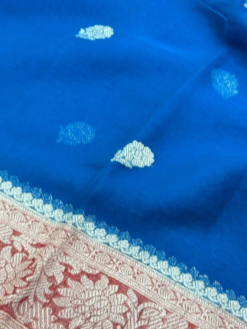 Banarasi Pure Khaddi Chiffon Silver Zari Royal Blue Colour Saree With Contrast Red Blouse & Pallu
