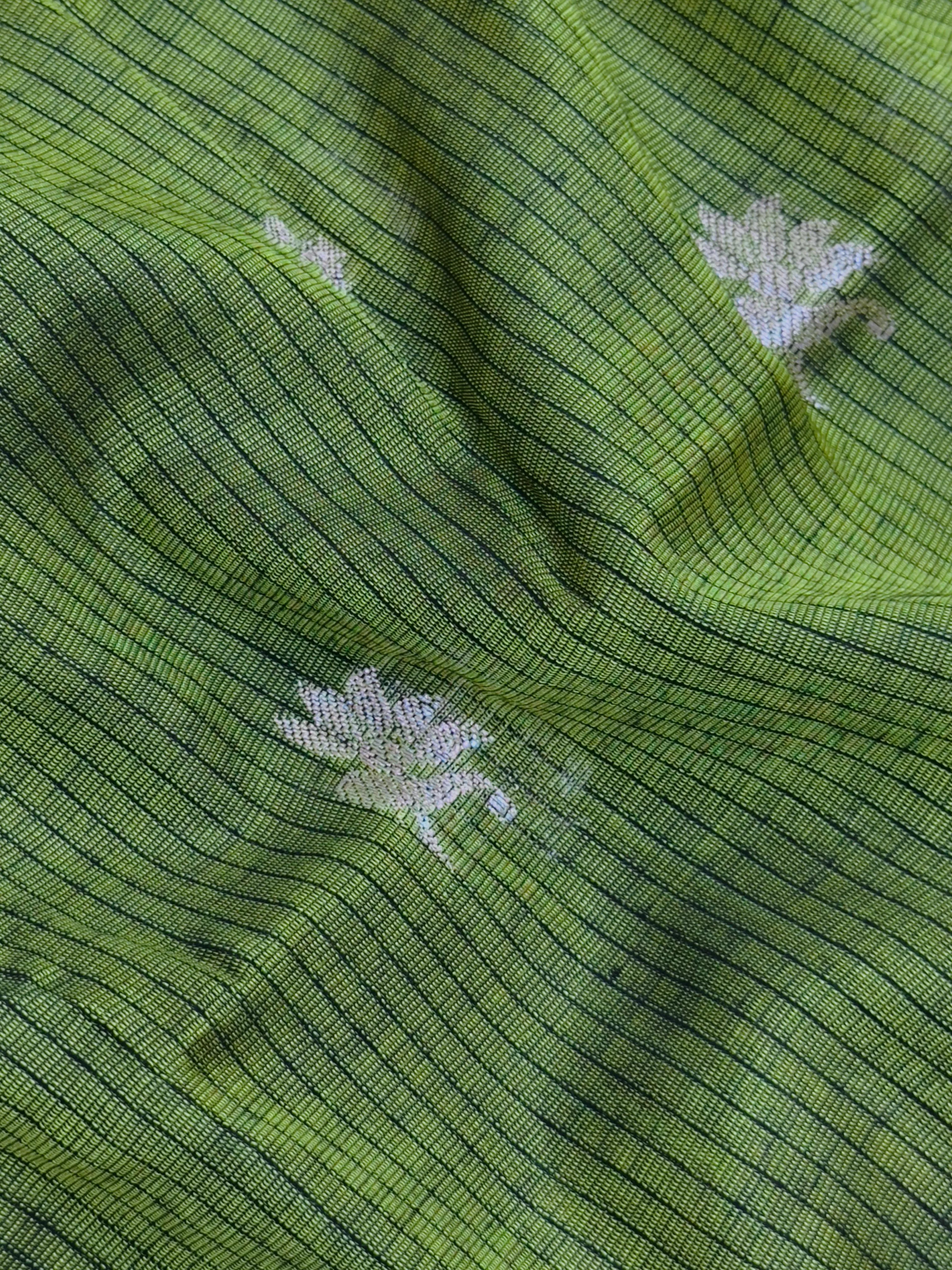 Kanchi linen saree with temple border and soft linen texture – ideal for festive and everyday traditional wear