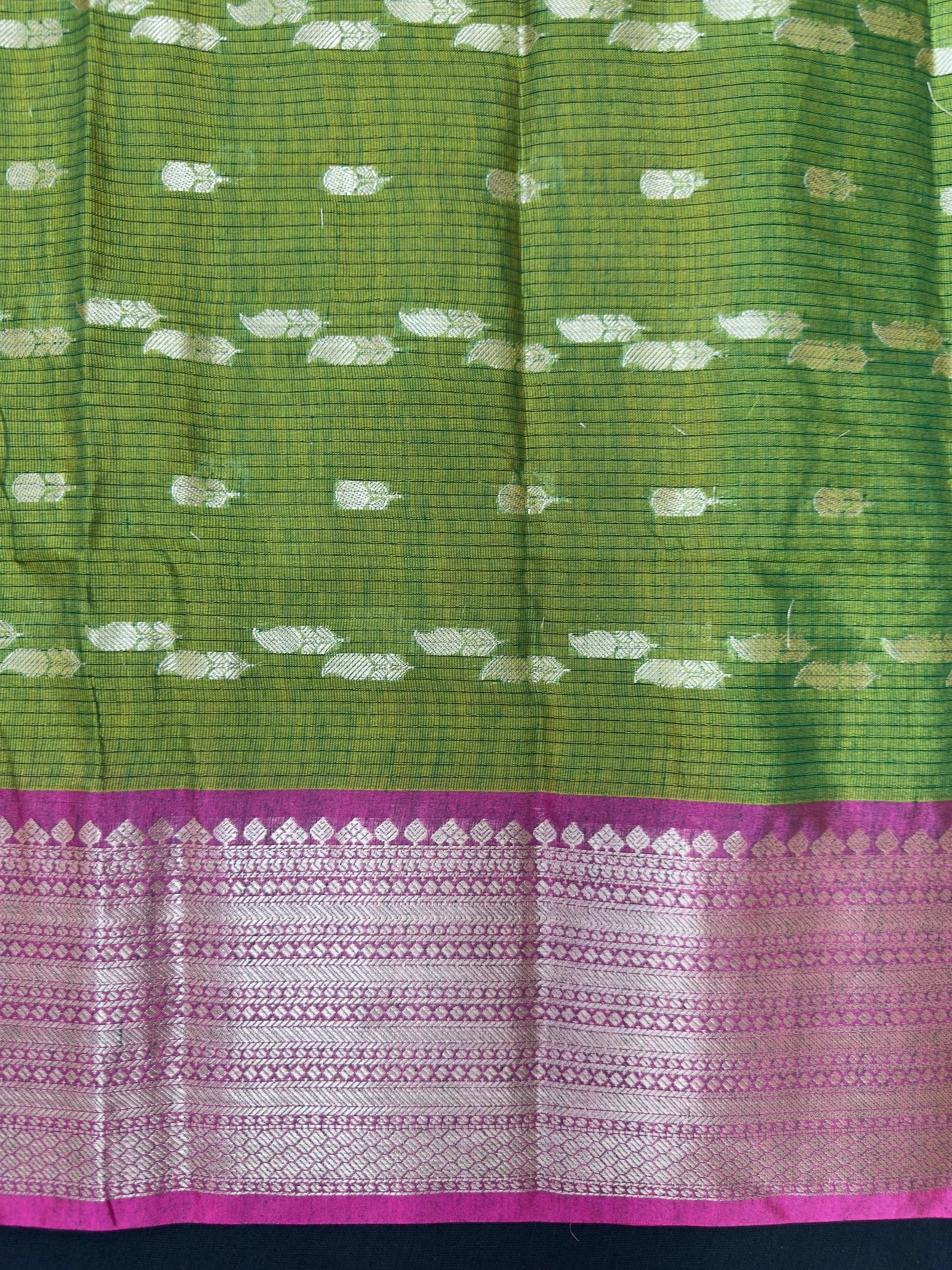 Kanchi linen saree with temple border and soft linen texture – ideal for festive and everyday traditional wear