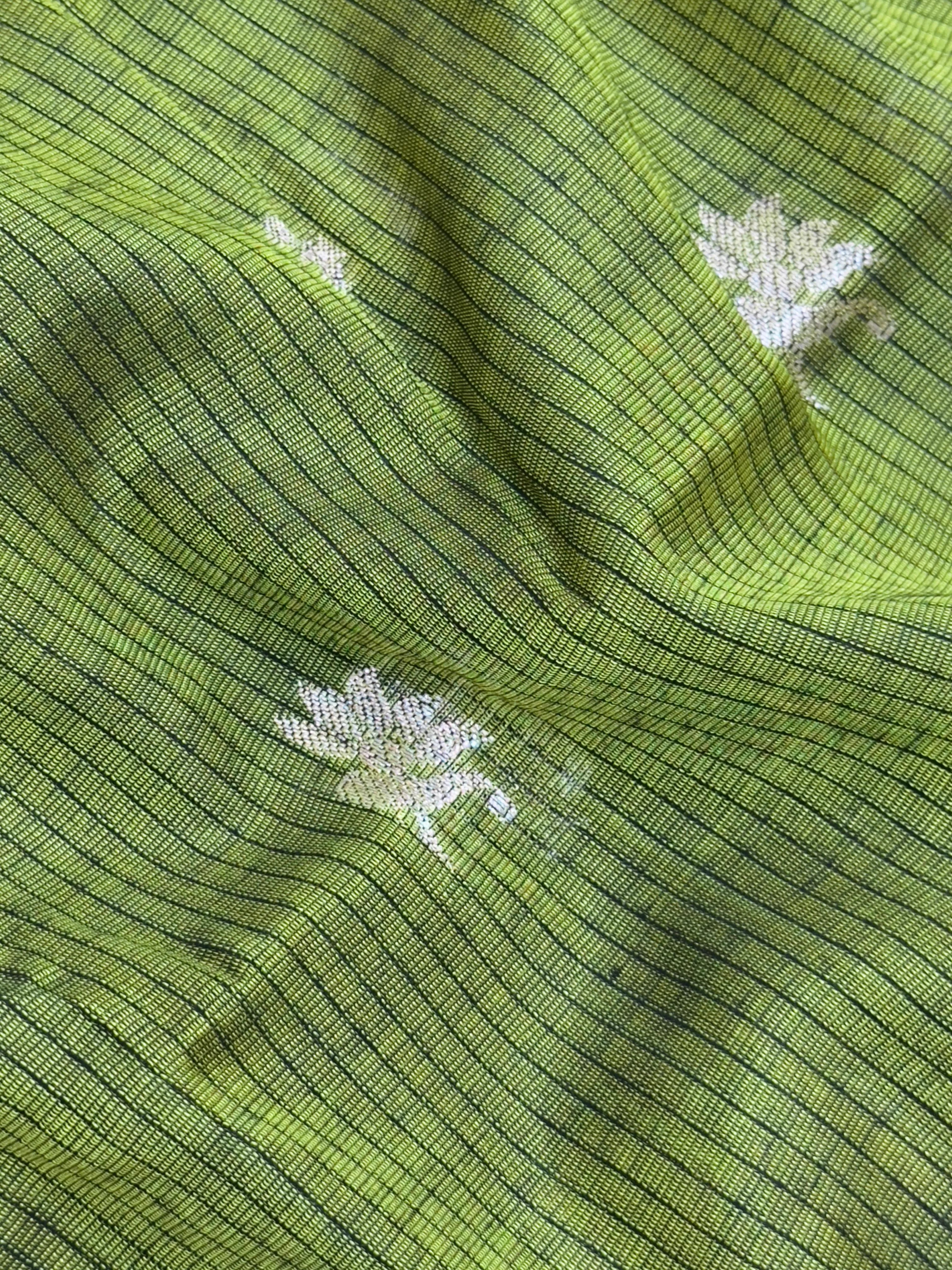 Kanchi linen saree with temple border and soft linen texture – ideal for festive and everyday traditional wear
