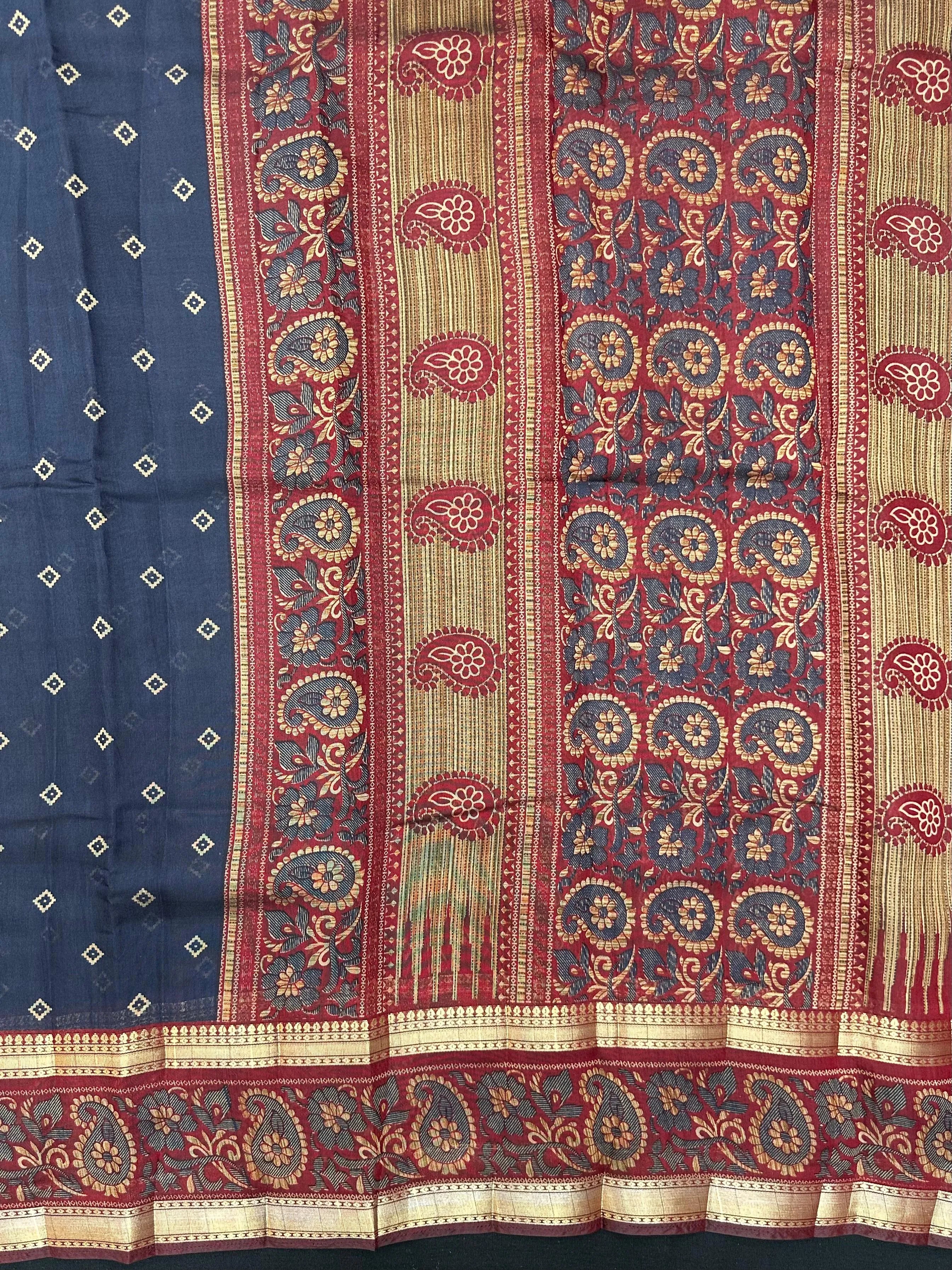 Woman wearing a Cotton Silk Saree with lightweight, soft fabric and subtle sheen, ideal for office, casual, and festive occasions.