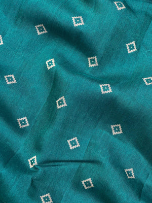 Woman wearing a Cotton Silk Saree with lightweight, soft fabric and subtle sheen, ideal for office, casual, and festive occasions.