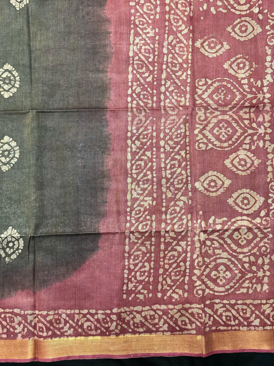 Woman in a soft, elegant Tussar Silk Saree with minimal design, ideal for daily wear, office, and casual traditional settings.