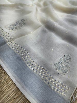 "Timeless Linen Silk Saree with a luxurious drape, combining comfort and elegance. Perfect for festive and ethnic wear, featuring a beautiful blend of linen and silk."