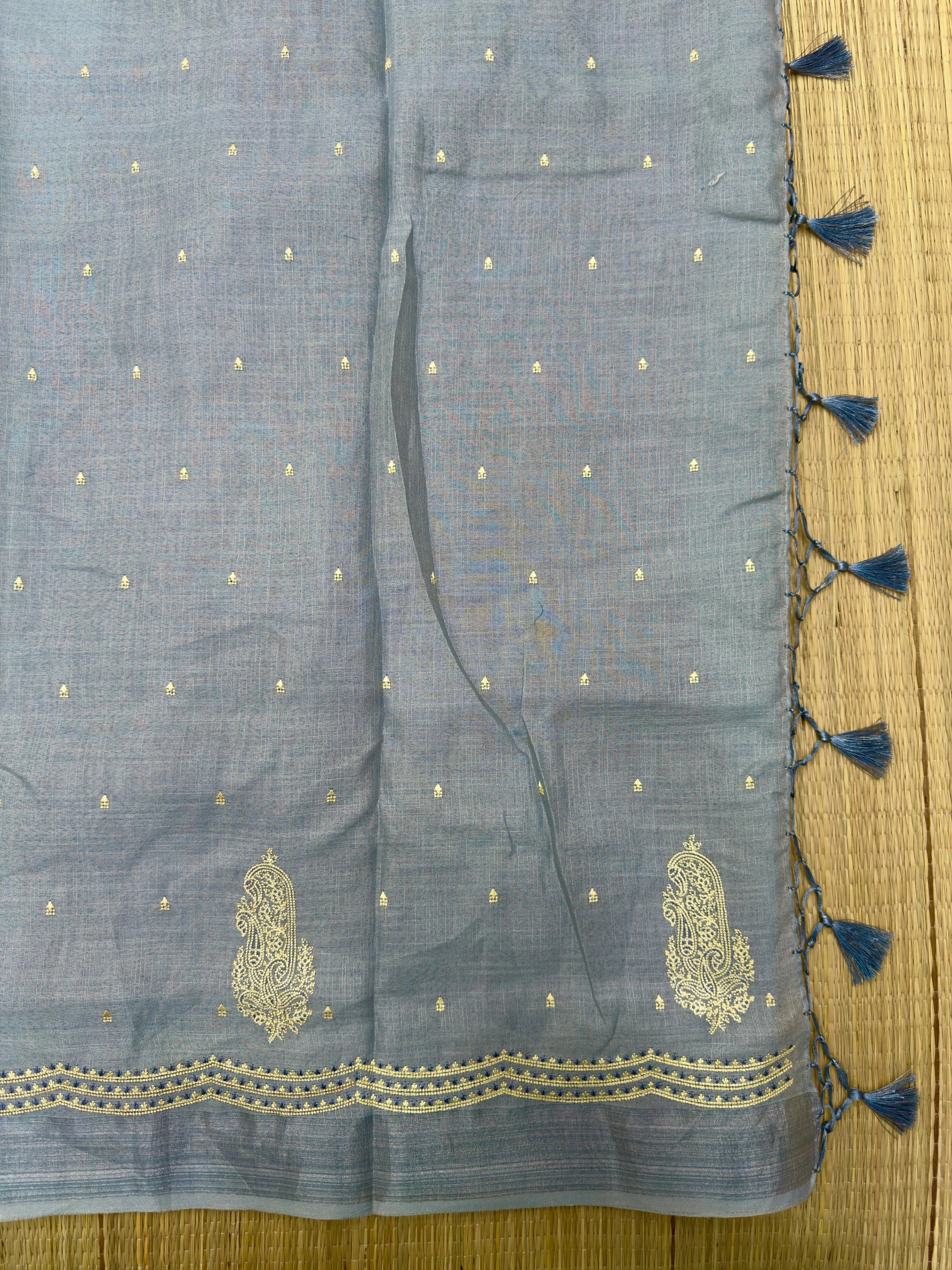 "Timeless Linen Silk Saree with a luxurious drape, combining comfort and elegance. Perfect for festive and ethnic wear, featuring a beautiful blend of linen and silk."