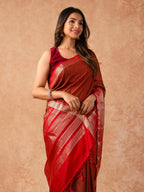 Woman wearing a Muggum Silk Saree with intricate embroidery and rich silk fabric, ideal for weddings, festivals, and traditional events.