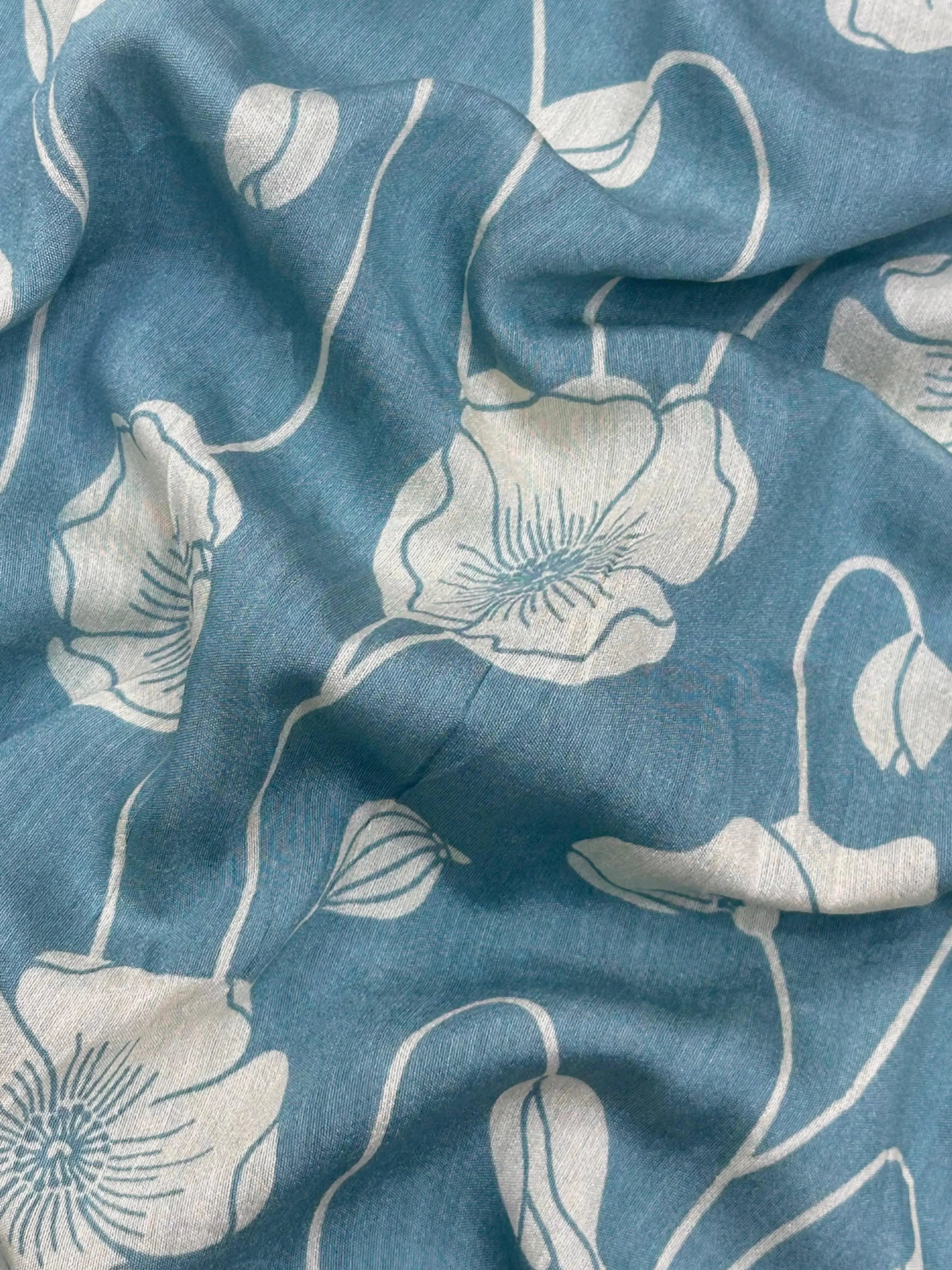 Woman wearing a Musk Cotton Saree with soft fabric and simple elegance, perfect for everyday or office wear.