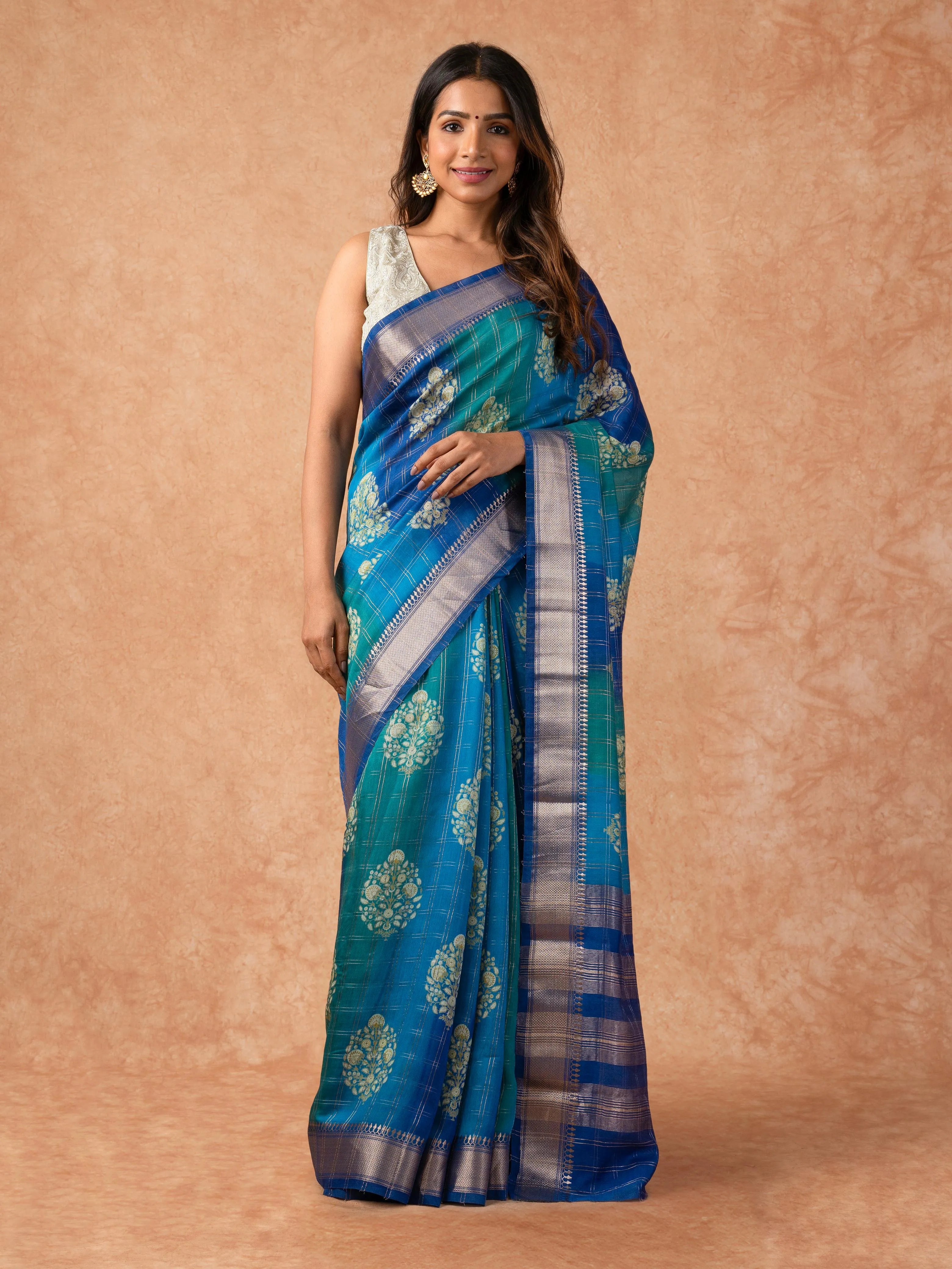Woman wearing a Musk Line Cotton Saree with soft, lightweight drape and subtle design, ideal for office, casual outings, and daily ethnic wear.