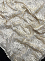 Organza saree with sheer, lightweight fabric and elegant motifs – perfect for festive and special occasions