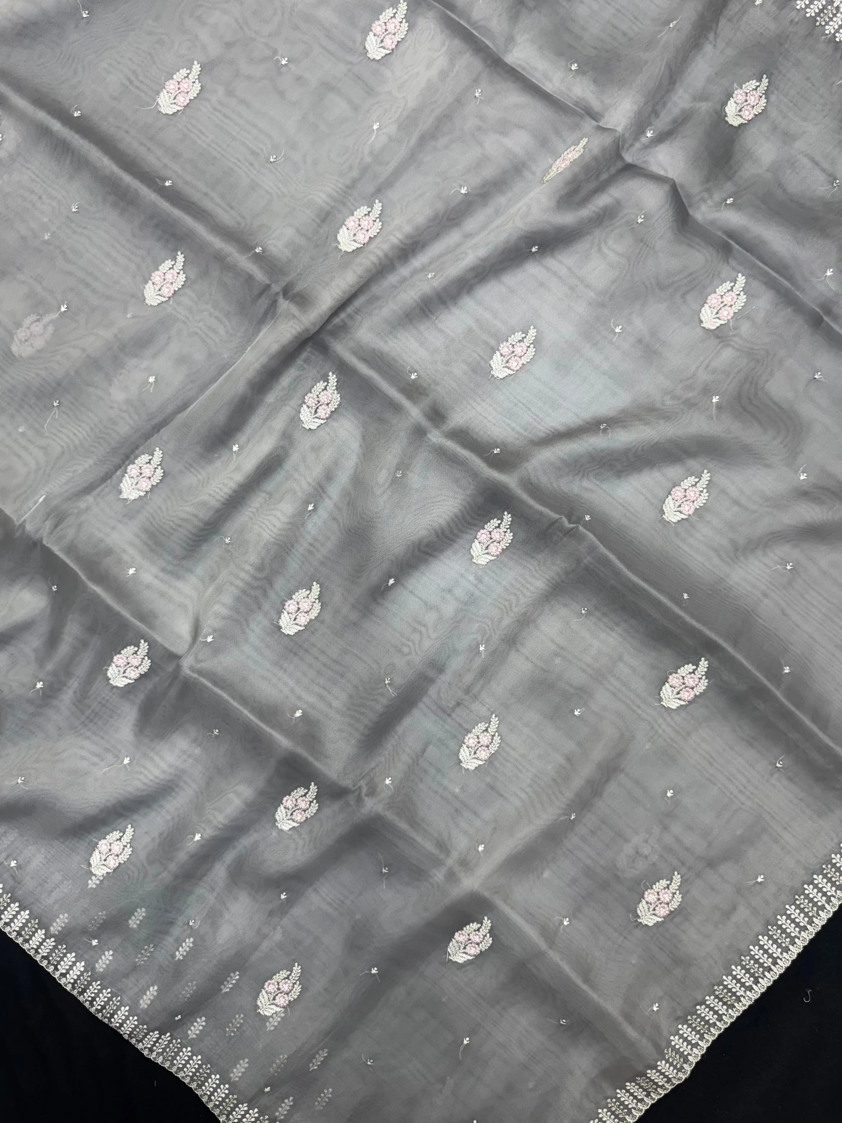 Woman wearing a sheer Organza Saree with elegant detailing and soft flow, perfect for festive events and stylish ethnic occasions.