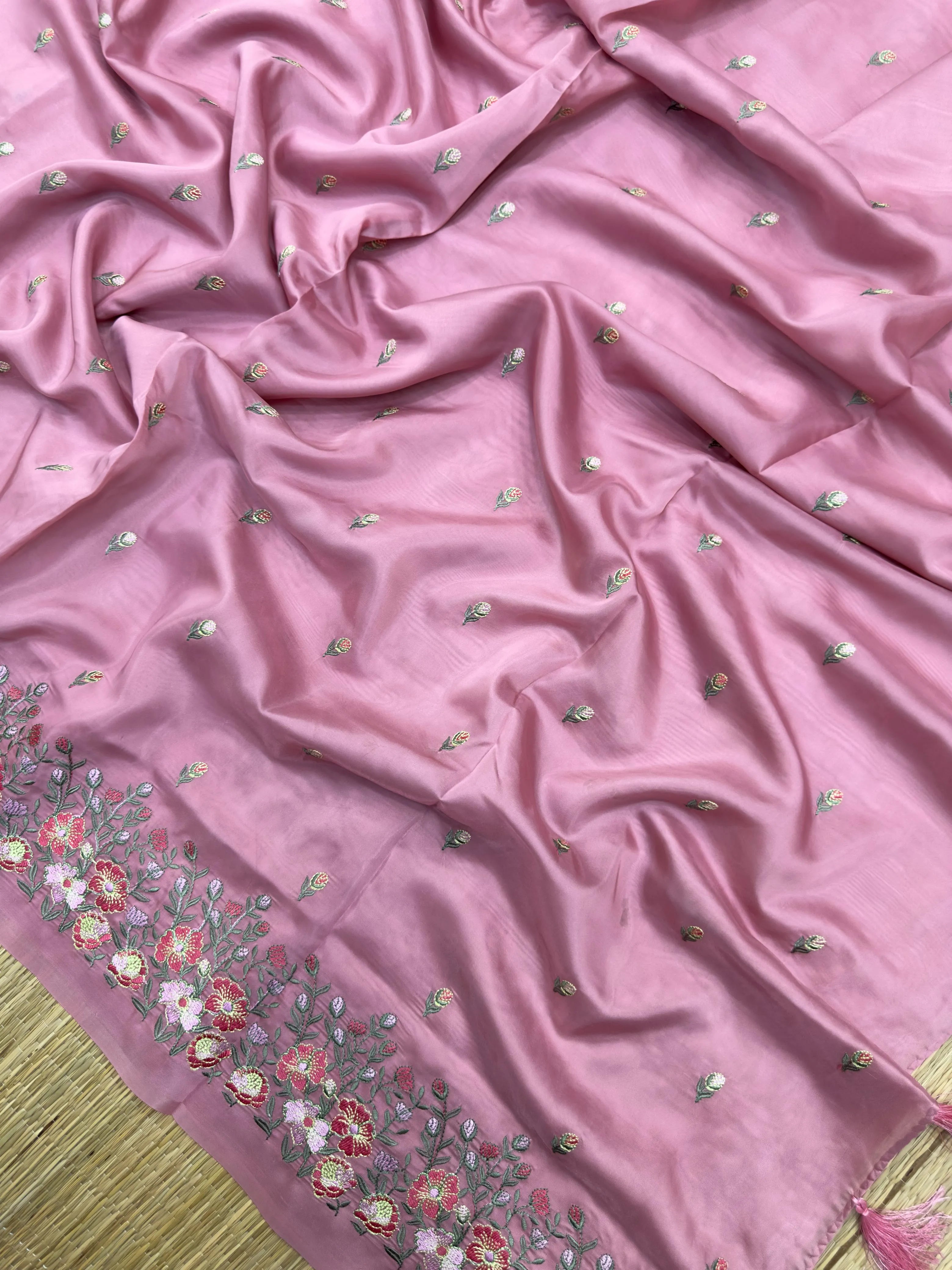 A stunning Organza Saree with a delicate sheen, designed for fancy and party wear. The lightweight, airy fabric drapes beautifully, adding glamour and elegance to any special occasion.