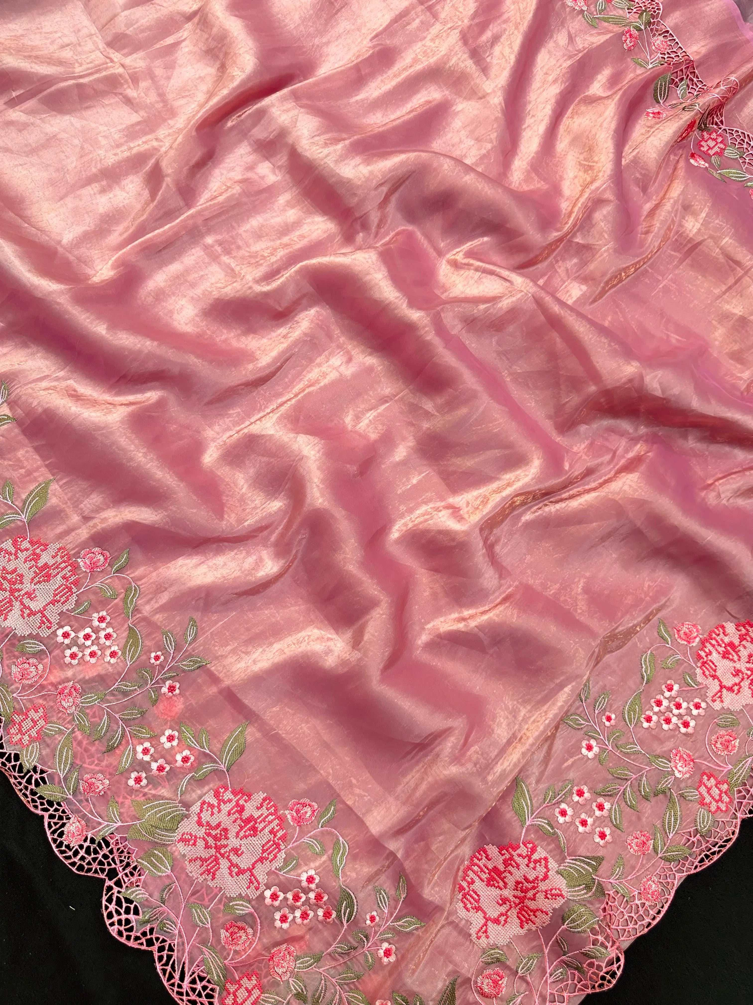 Woman wearing a Paper Silk Saree with crisp texture and elegant drape, ideal for office wear, casual events, and festive occasions.