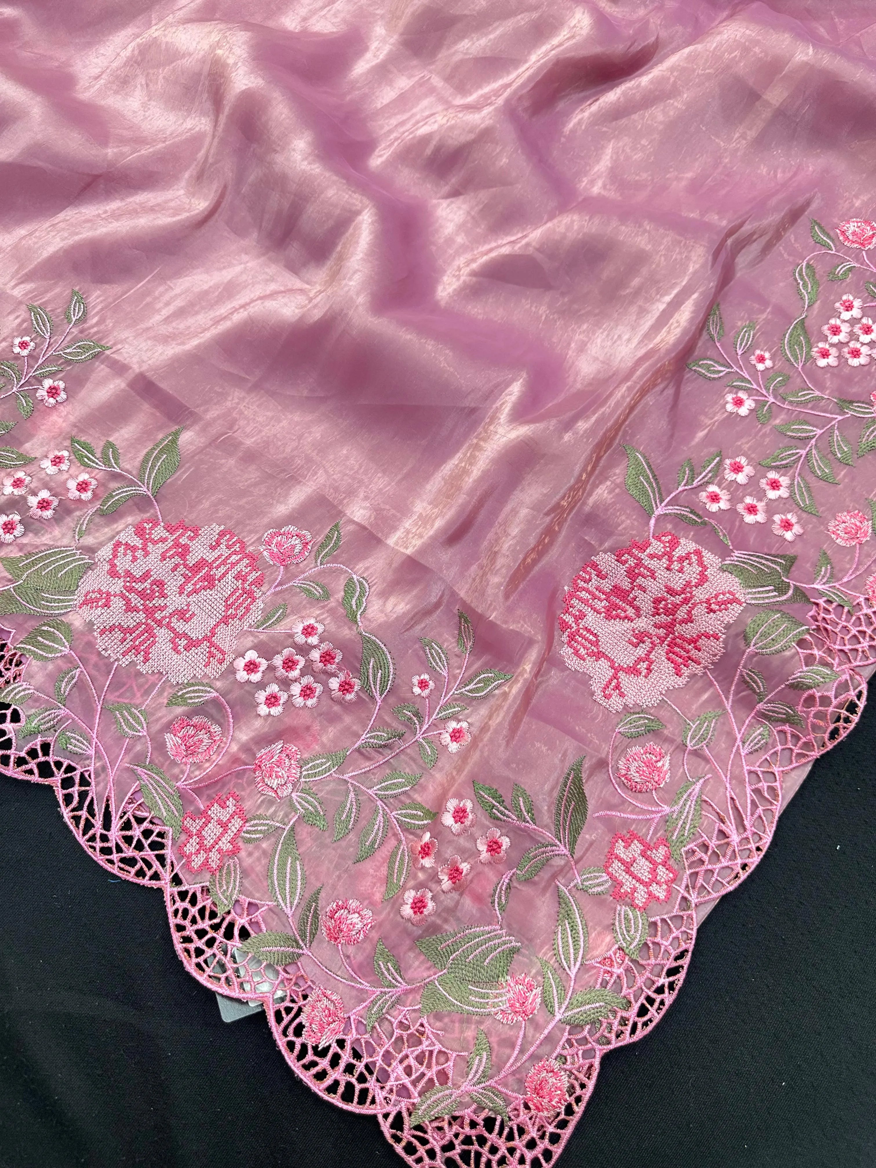 Woman wearing a Paper Silk Saree with crisp texture and elegant drape, ideal for office wear, casual events, and festive occasions.