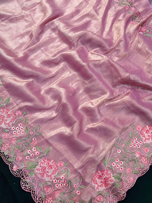 Woman wearing a Paper Silk Saree with crisp texture and elegant drape, ideal for office wear, casual events, and festive occasions.