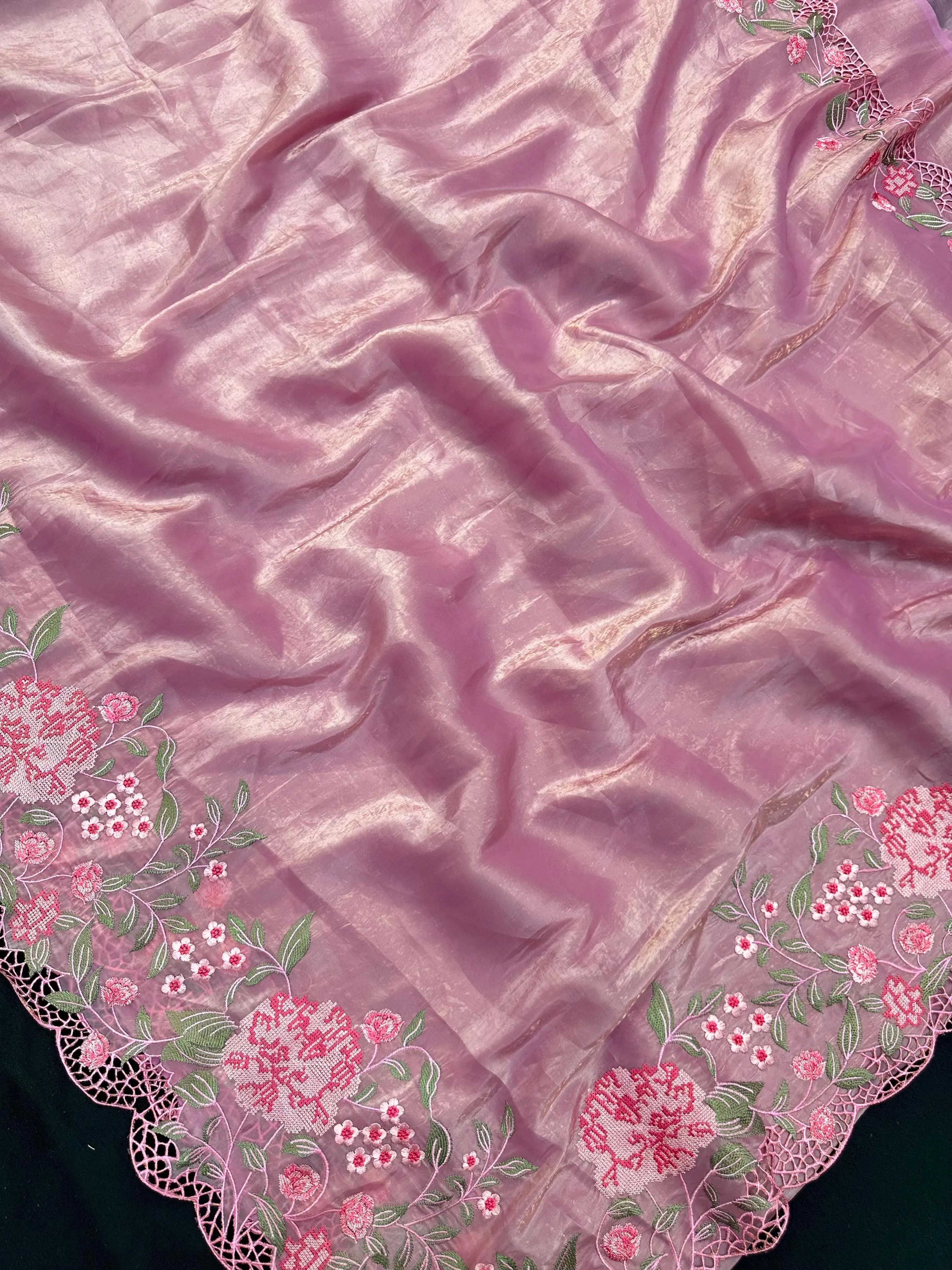 Woman wearing a Paper Silk Saree with crisp texture and elegant drape, ideal for office wear, casual events, and festive occasions.