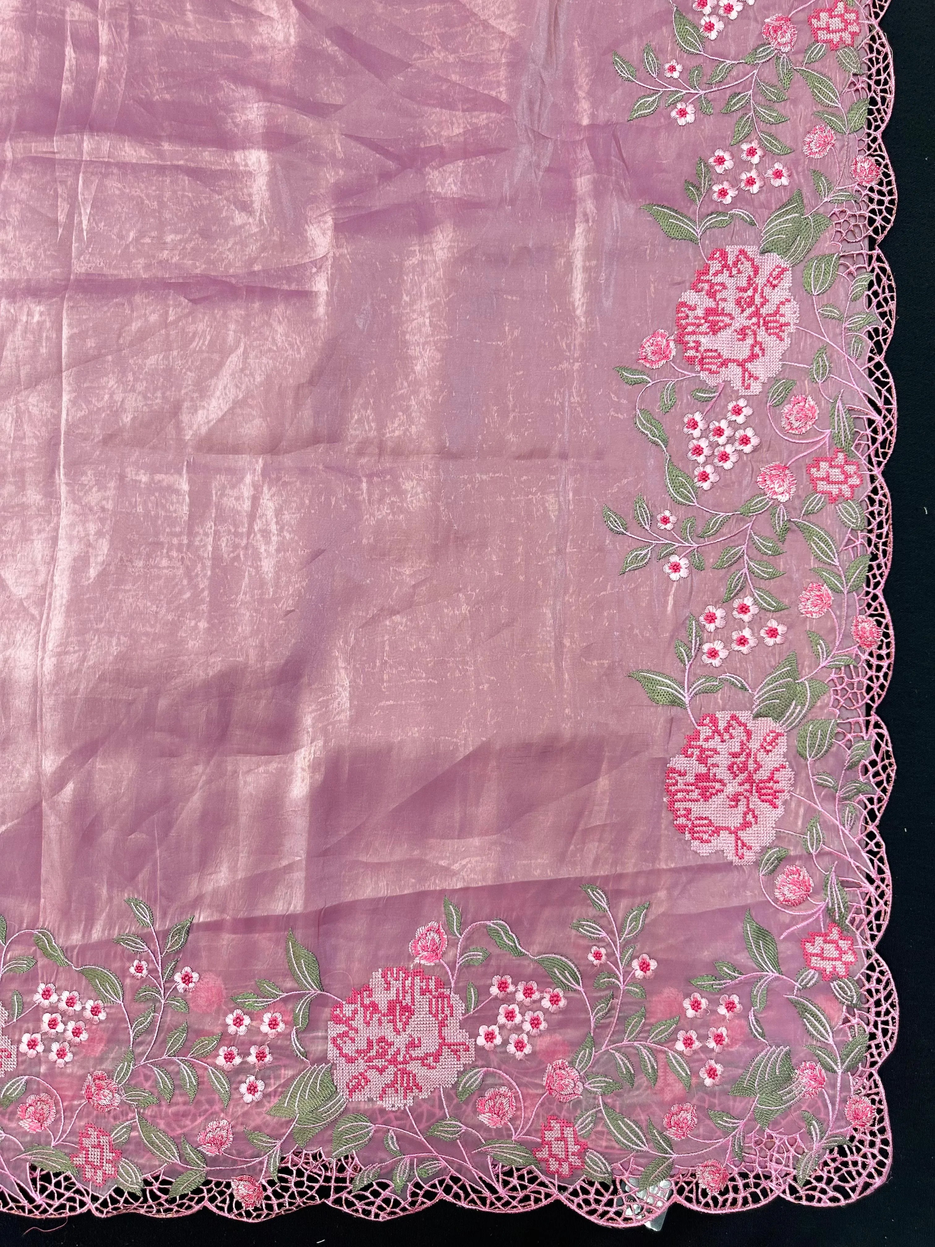 Woman wearing a Paper Silk Saree with crisp texture and elegant drape, ideal for office wear, casual events, and festive occasions.