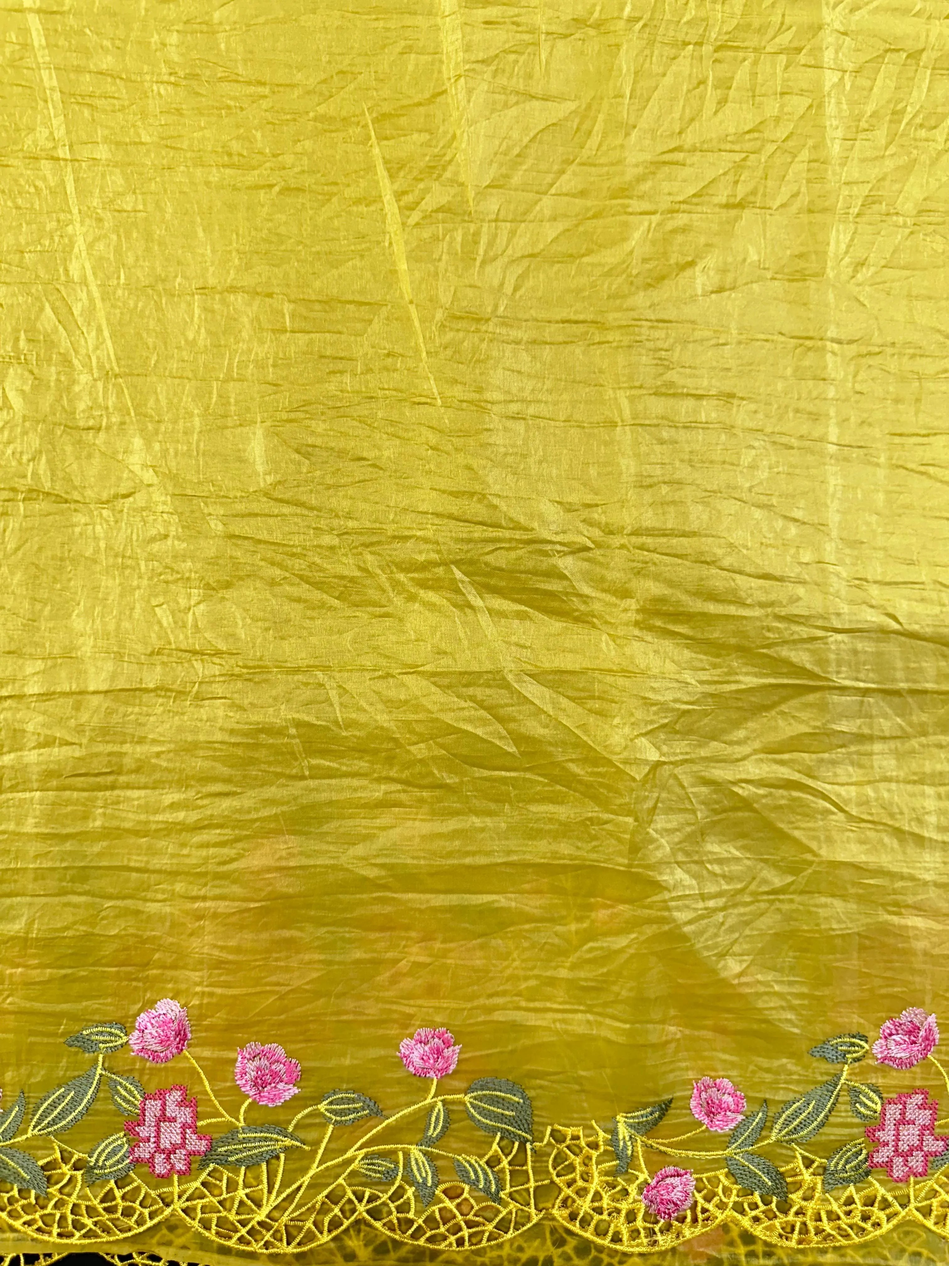 Woman wearing a Paper Silk Saree with crisp texture and elegant drape, ideal for office wear, casual events, and festive occasions.
