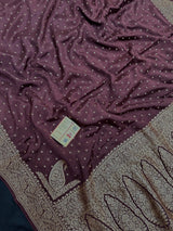 Pure Banarasi crepe silk saree with rich zari work and soft flowing texture – ideal for weddings and festive occasions