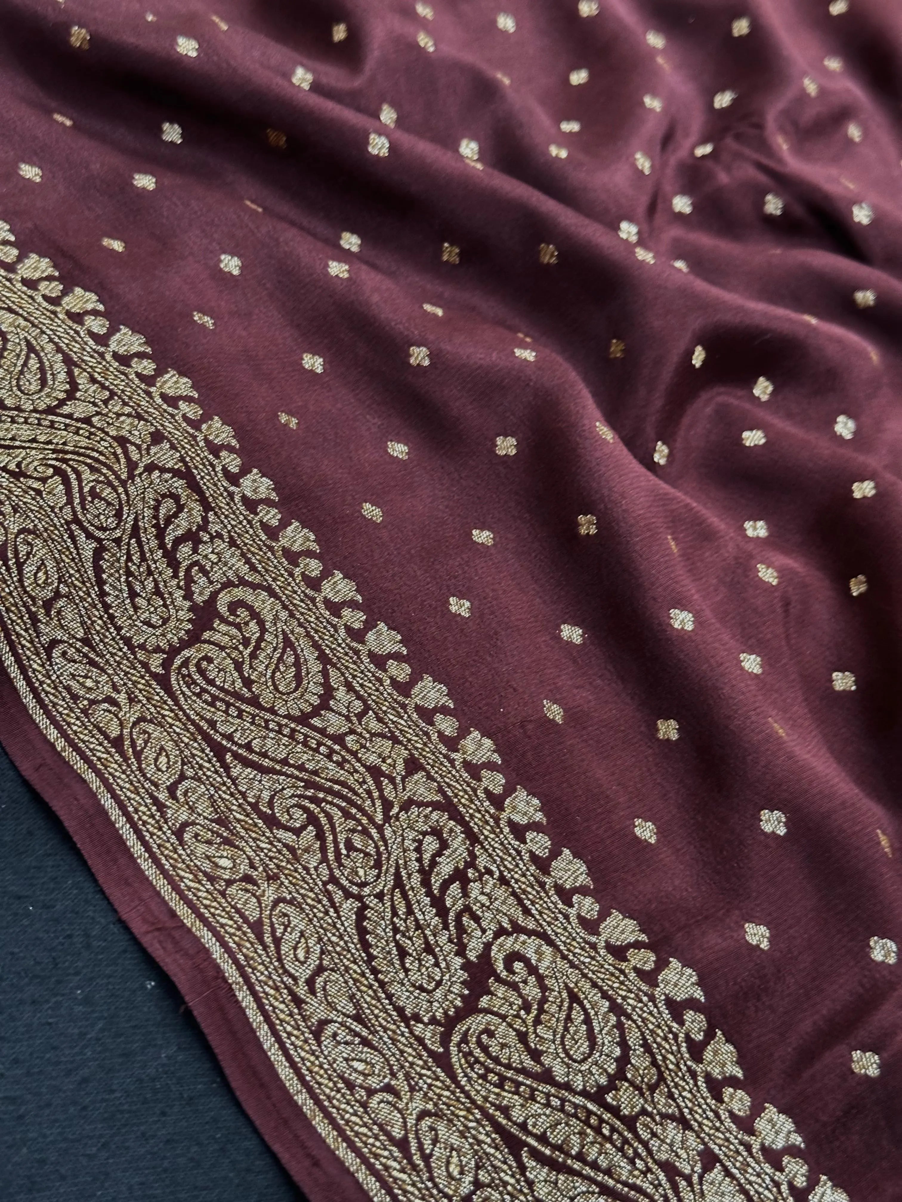 Pure Banarasi crepe silk saree with rich zari work and soft flowing texture – ideal for weddings and festive occasions