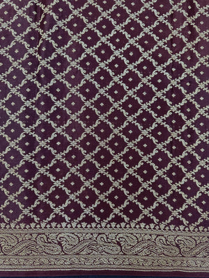 Pure Banarasi crepe silk saree with rich zari work and soft flowing texture – ideal for weddings and festive occasions