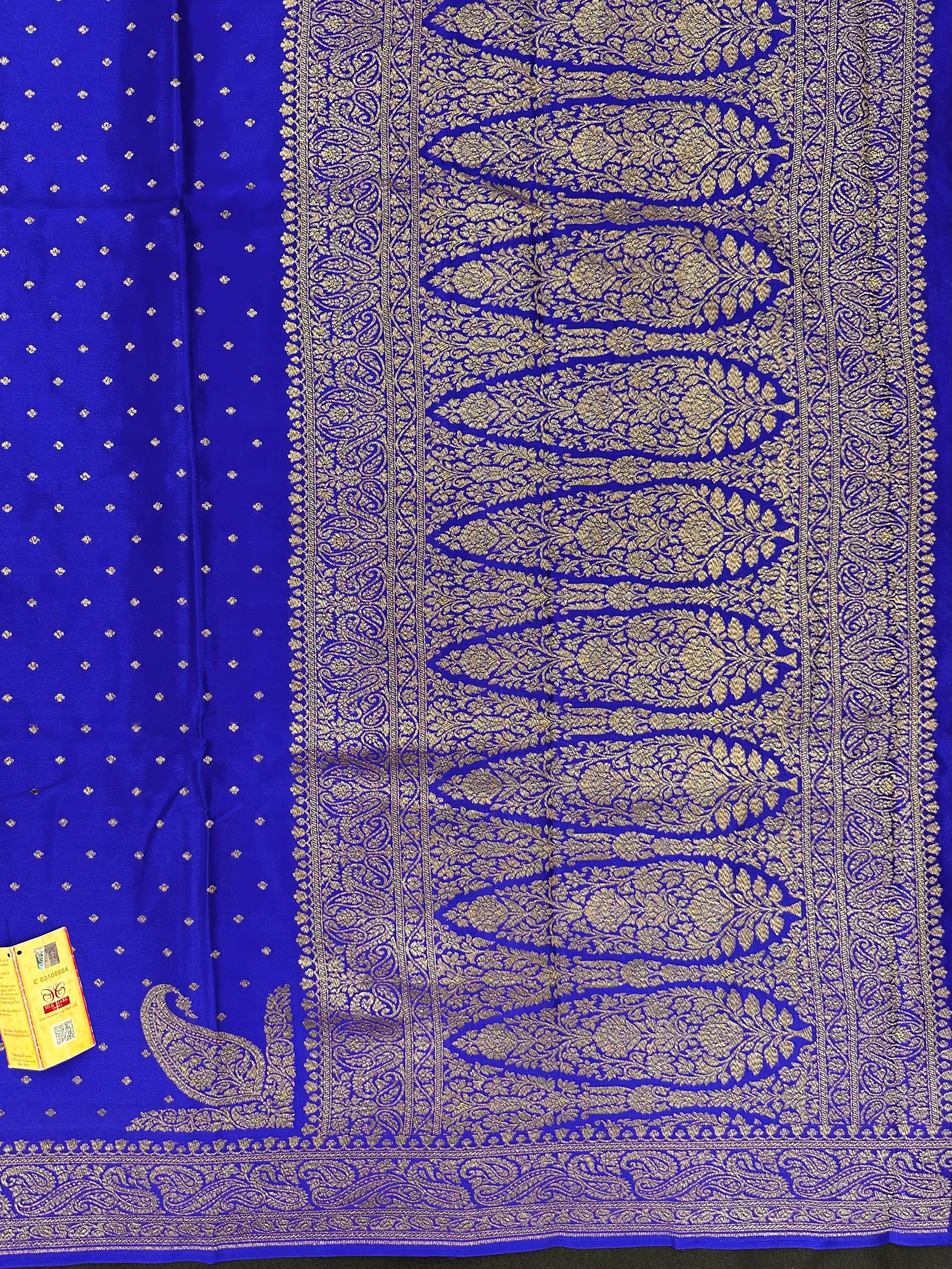 Pure Banarasi crepe silk saree with rich zari work and soft flowing texture – ideal for weddings and festive occasions