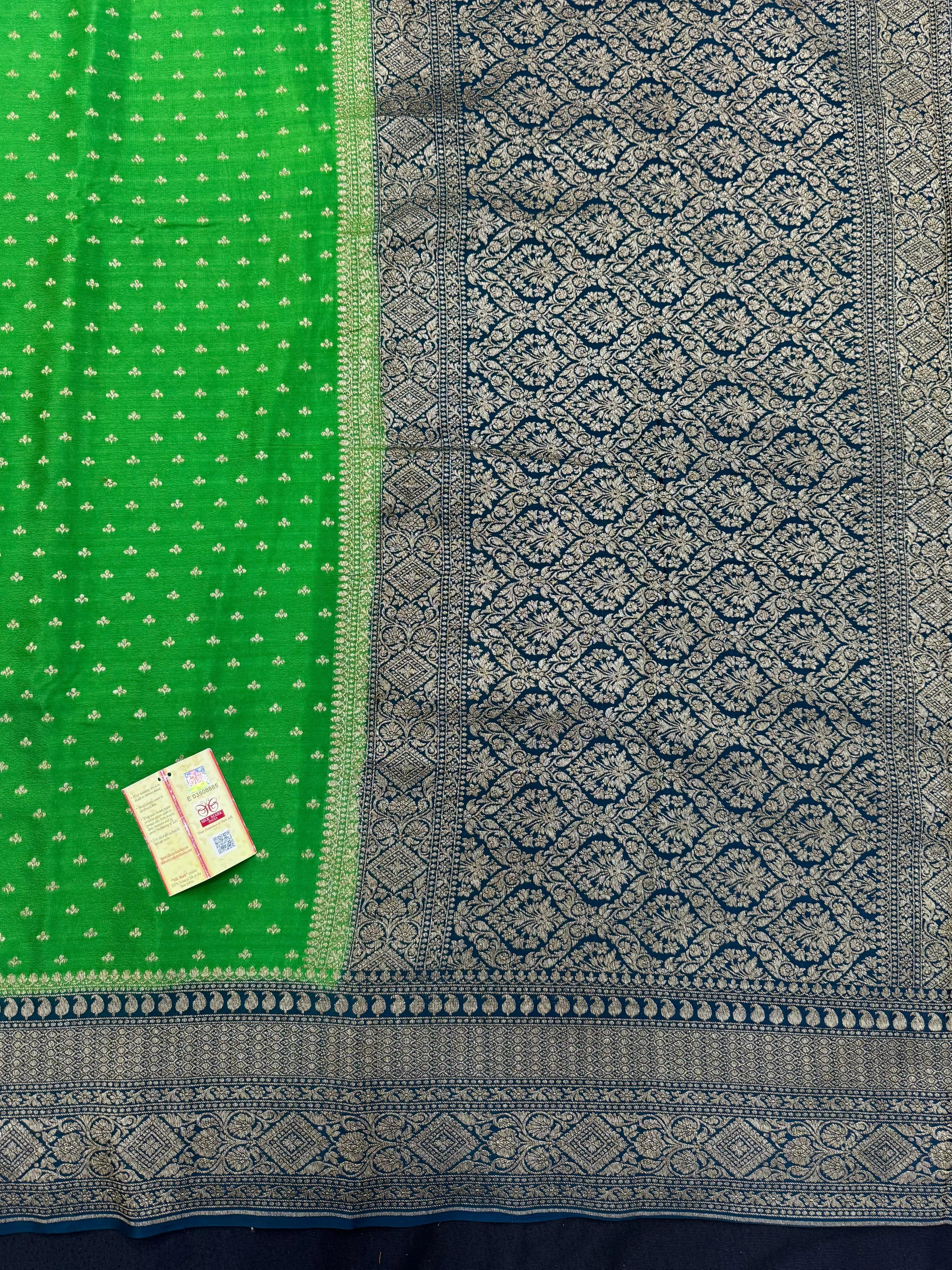 Pure Banarasi crepe silk saree with rich zari detailing and soft drape – ideal for festive and bridal occasions