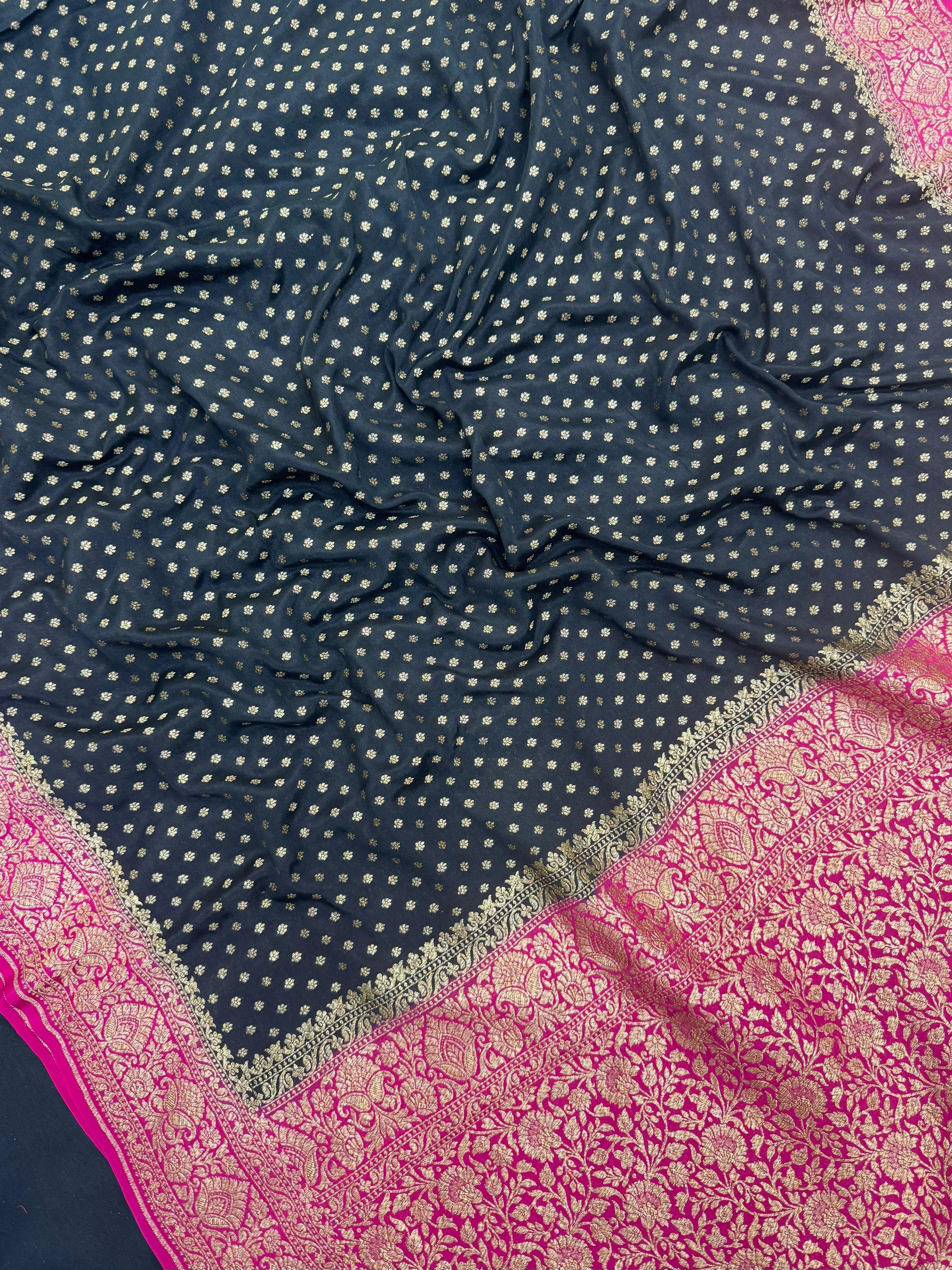 Woman draped in a Pure Banarasi Crepe Silk Saree with soft crepe texture and intricate zari work, perfect for weddings and festive occasions.
