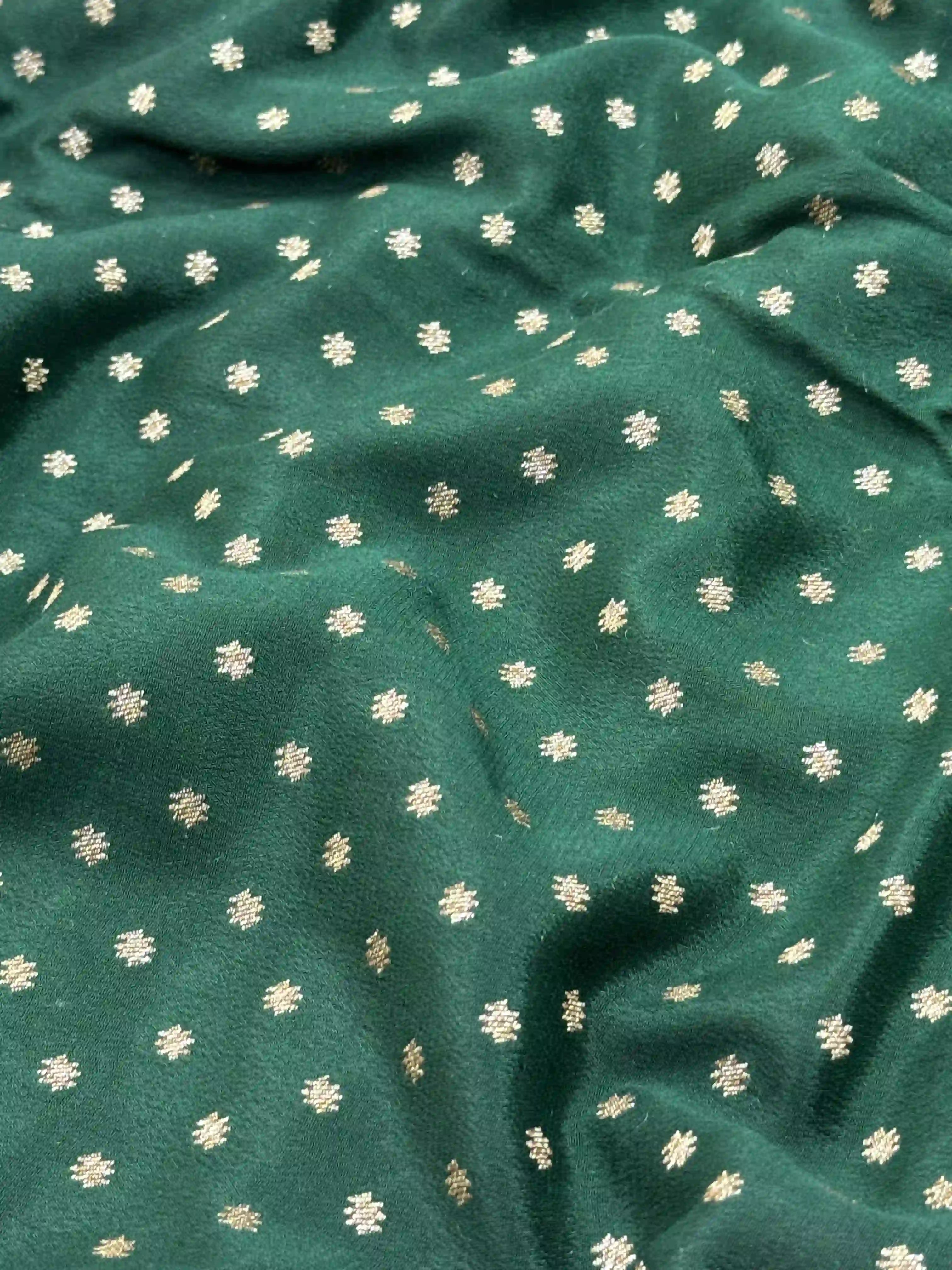 Pure Banarasi crepe silk saree with rich zari motifs and elegant soft drape – ideal for festive and wedding occasions