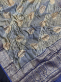 "Sleek Pure Chinya silk saree with intricate detailing, ideal for festive and wedding occasions, showcasing elegance and classic style."