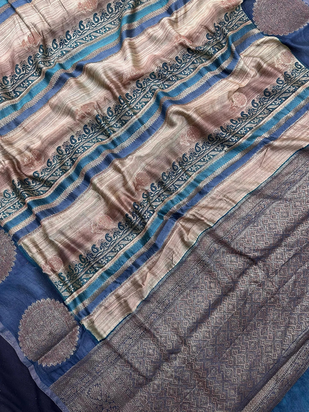Woman wearing a traditional Chinya Silk Saree in elegant colors with woven pallu and festive motifs, ideal for weddings and Indian celebrations.