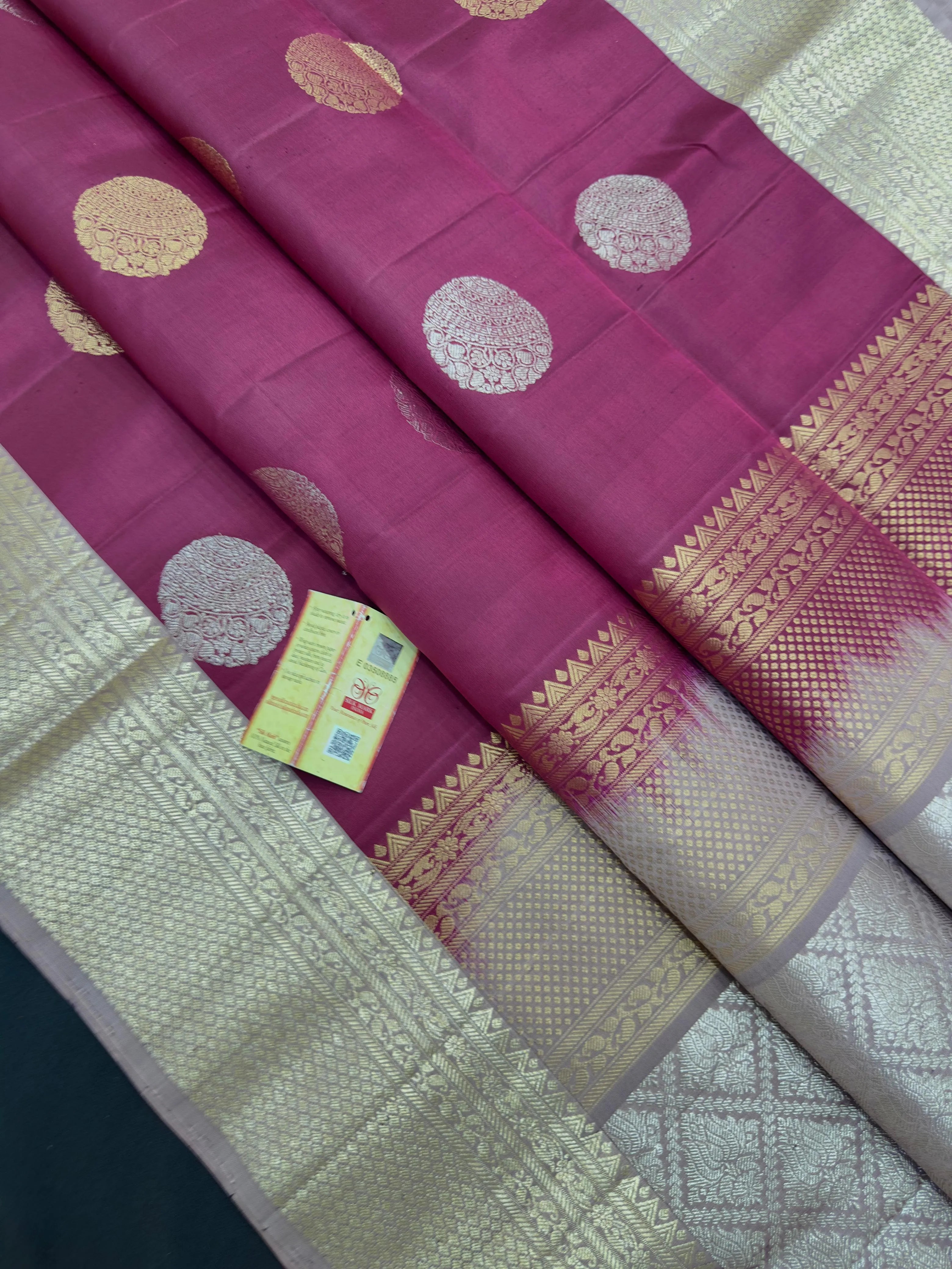 Pure Kanjivaram silk saree with traditional zari work and vibrant color – perfect for bridal and festive wear