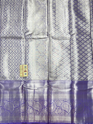 Pure Kanjivaram silk saree with golden zari border and rich silk texture – ideal for bridal and traditional wear

