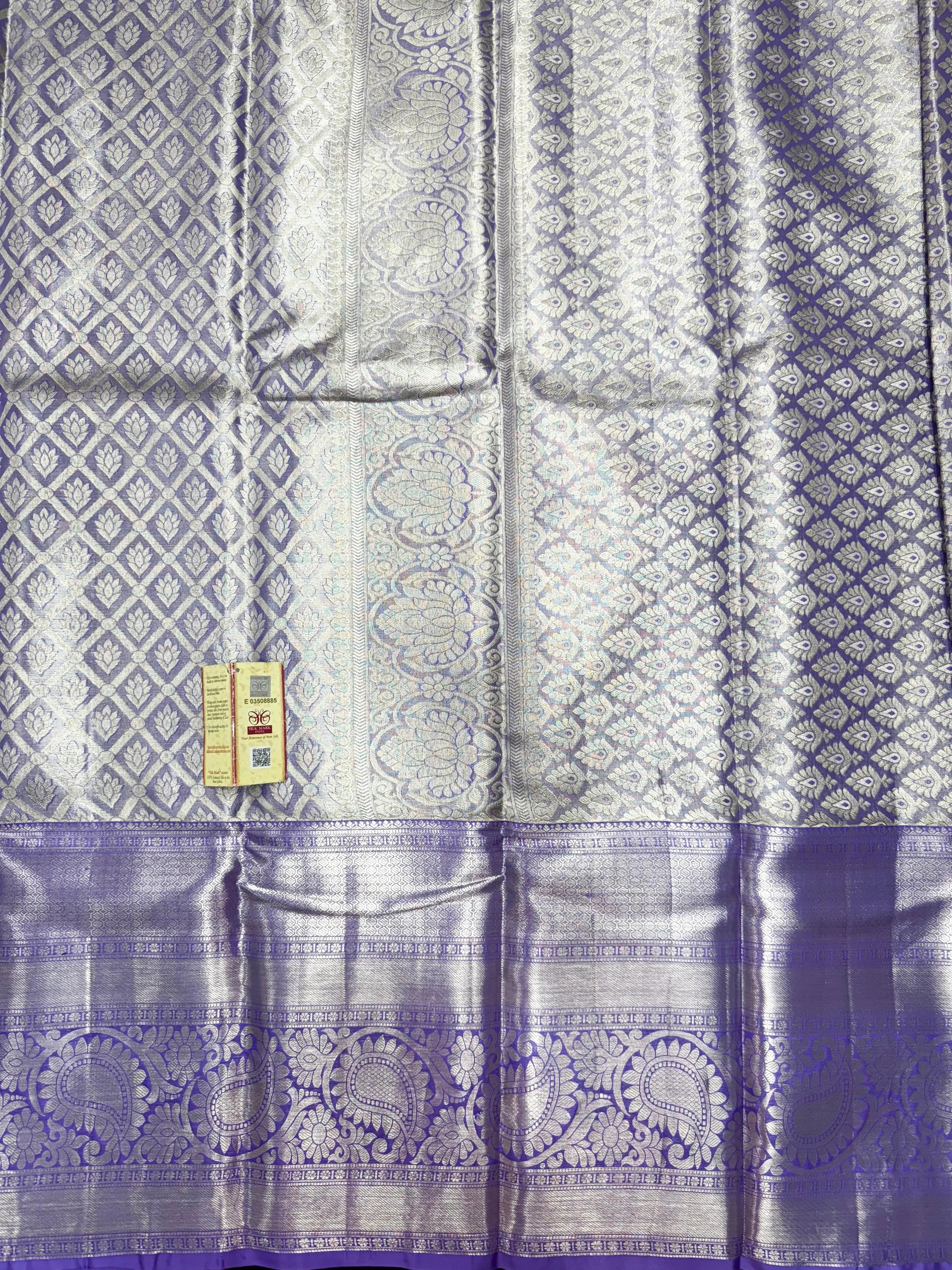 Pure Kanjivaram silk saree with golden zari border and rich silk texture – ideal for bridal and traditional wear


