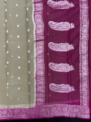 Woman draped in a Handloom Pure Khaddi Chiffon Silk Saree with golden zari work – traditional Indian ethnic wear