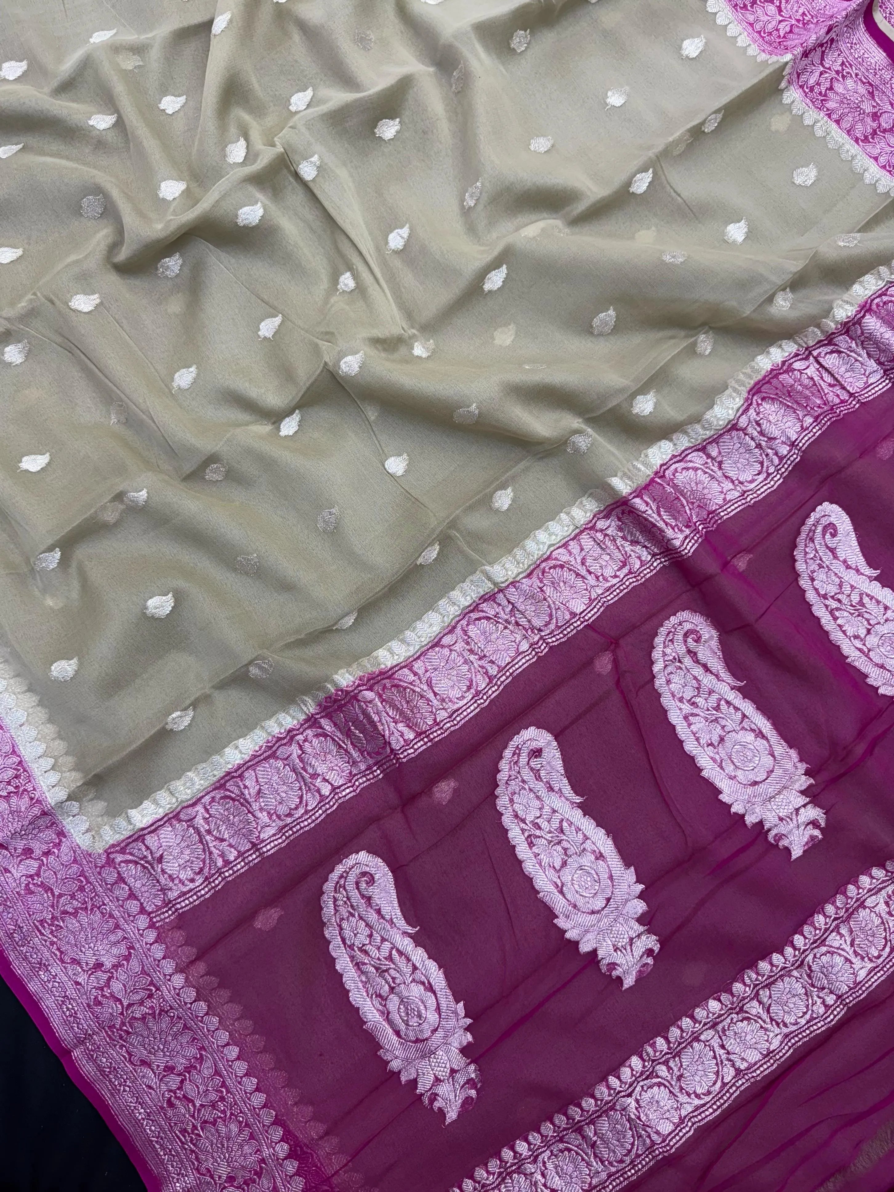Woman draped in a Handloom Pure Khaddi Chiffon Silk Saree with golden zari work – traditional Indian ethnic wear