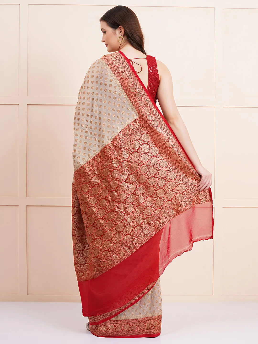"Elegant pure Khaddi georgette silk saree, perfect for ethnic wear and wedding celebrations, offering a beautiful drape and intricate design for a sophisticated look."