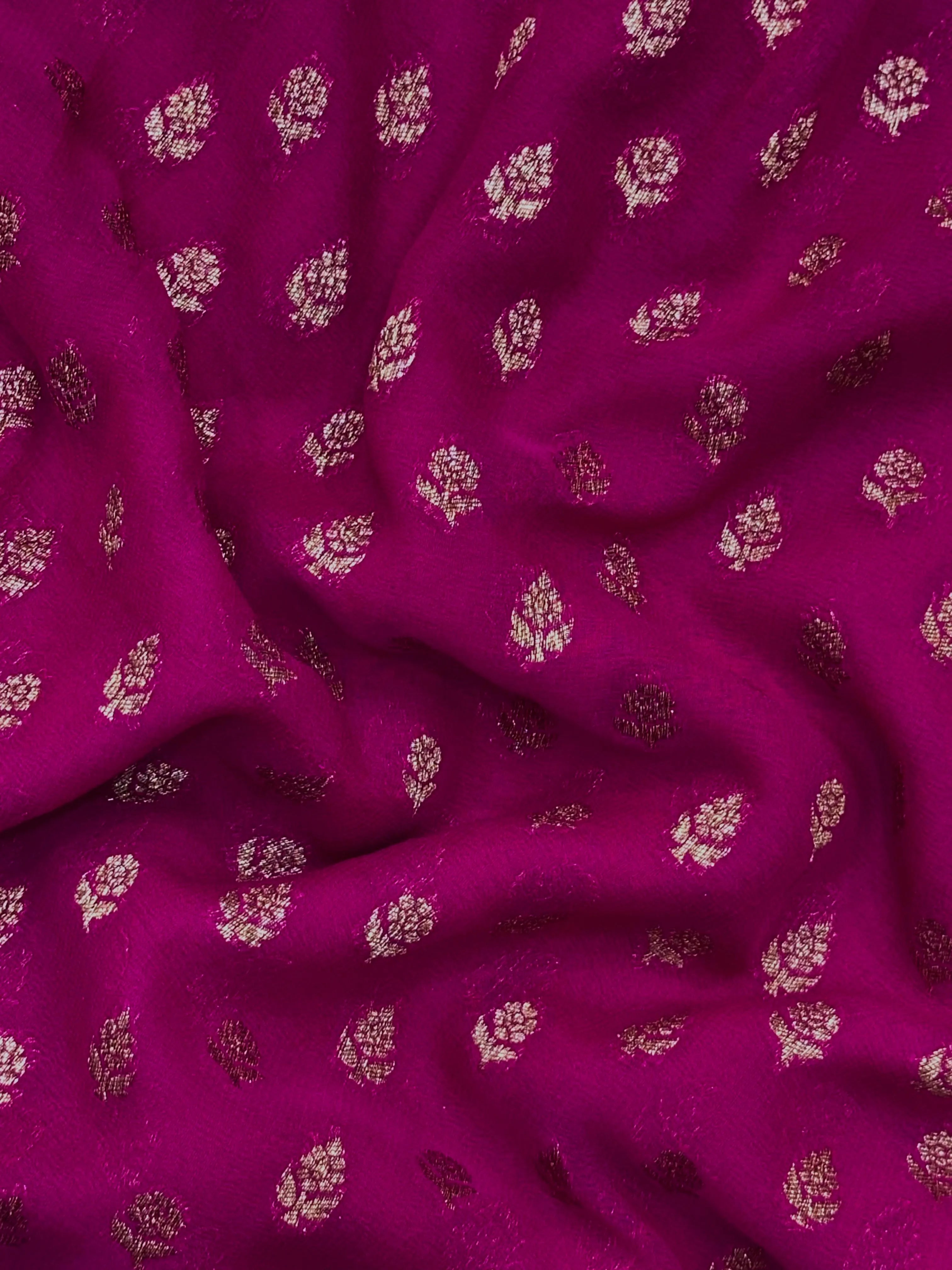 Woman wearing a Pure Khaddi Georgette Saree with rich zari work and flowing drape – ideal for festive and traditional occasions.